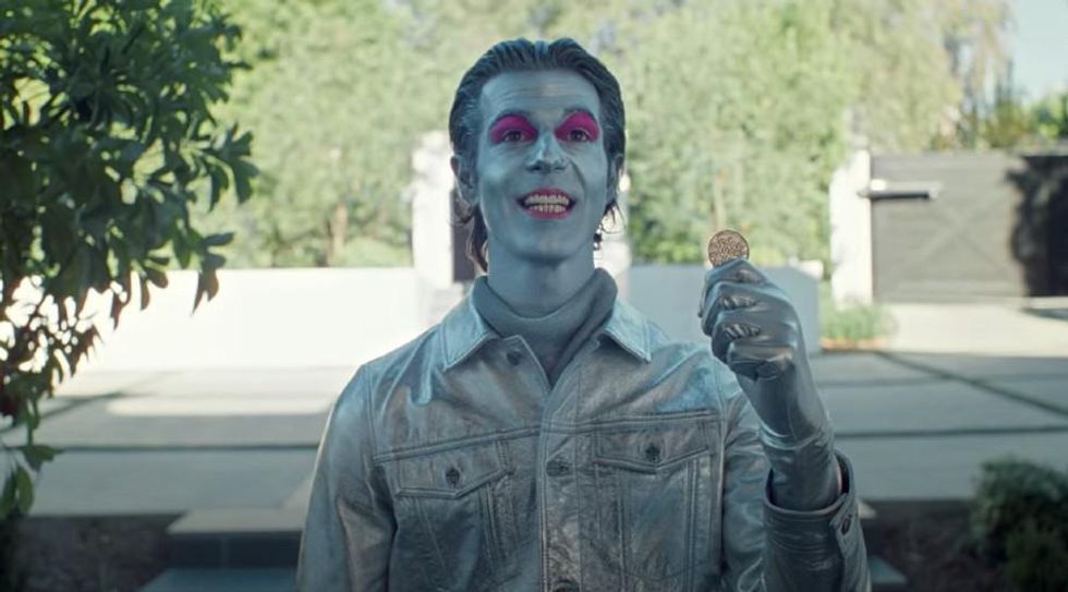 Chip Chrome is holding a coin