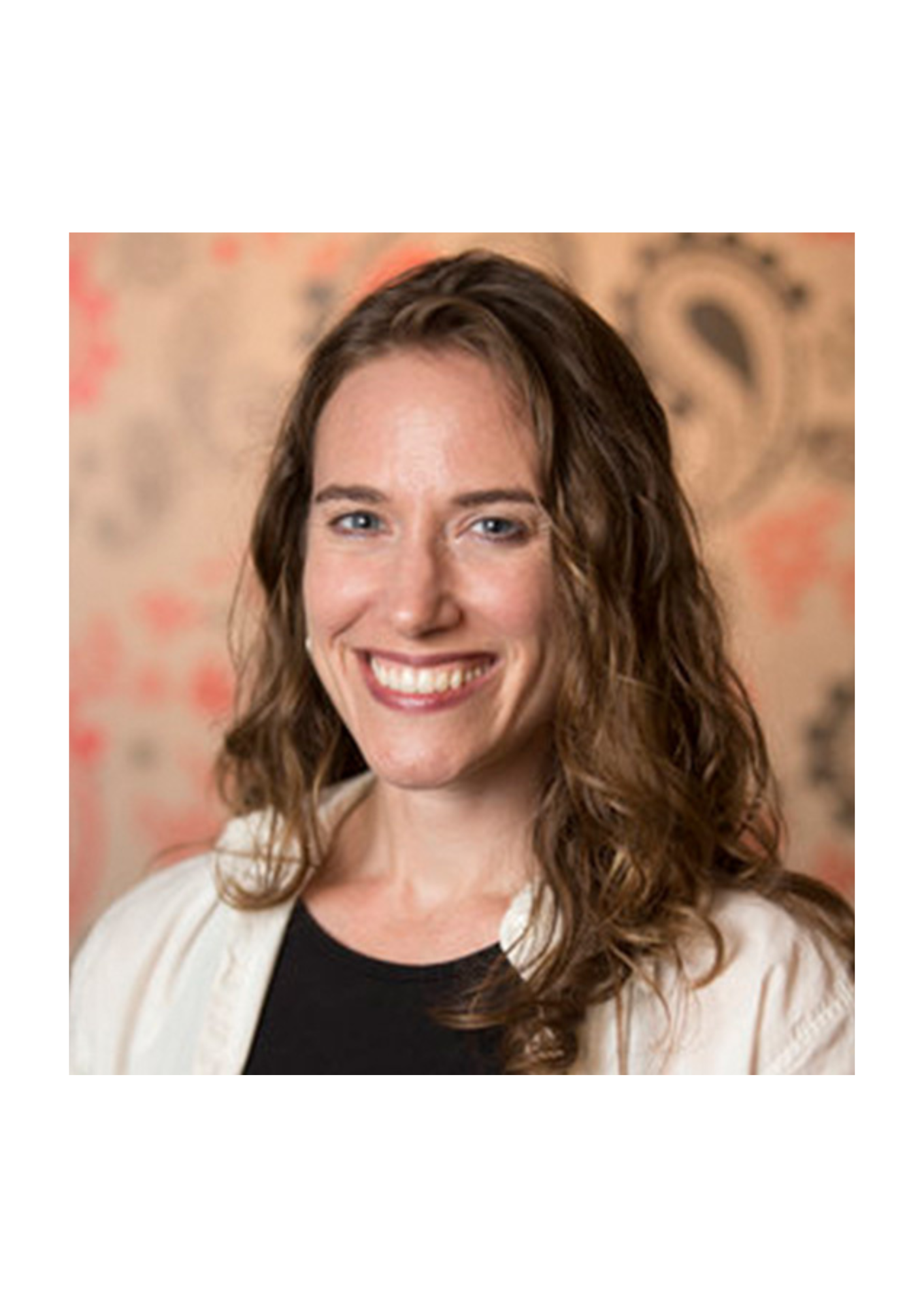 Dr. Steffany Moonaz, a white woman wearing a collared shirt is smiling infront of an orange background. 