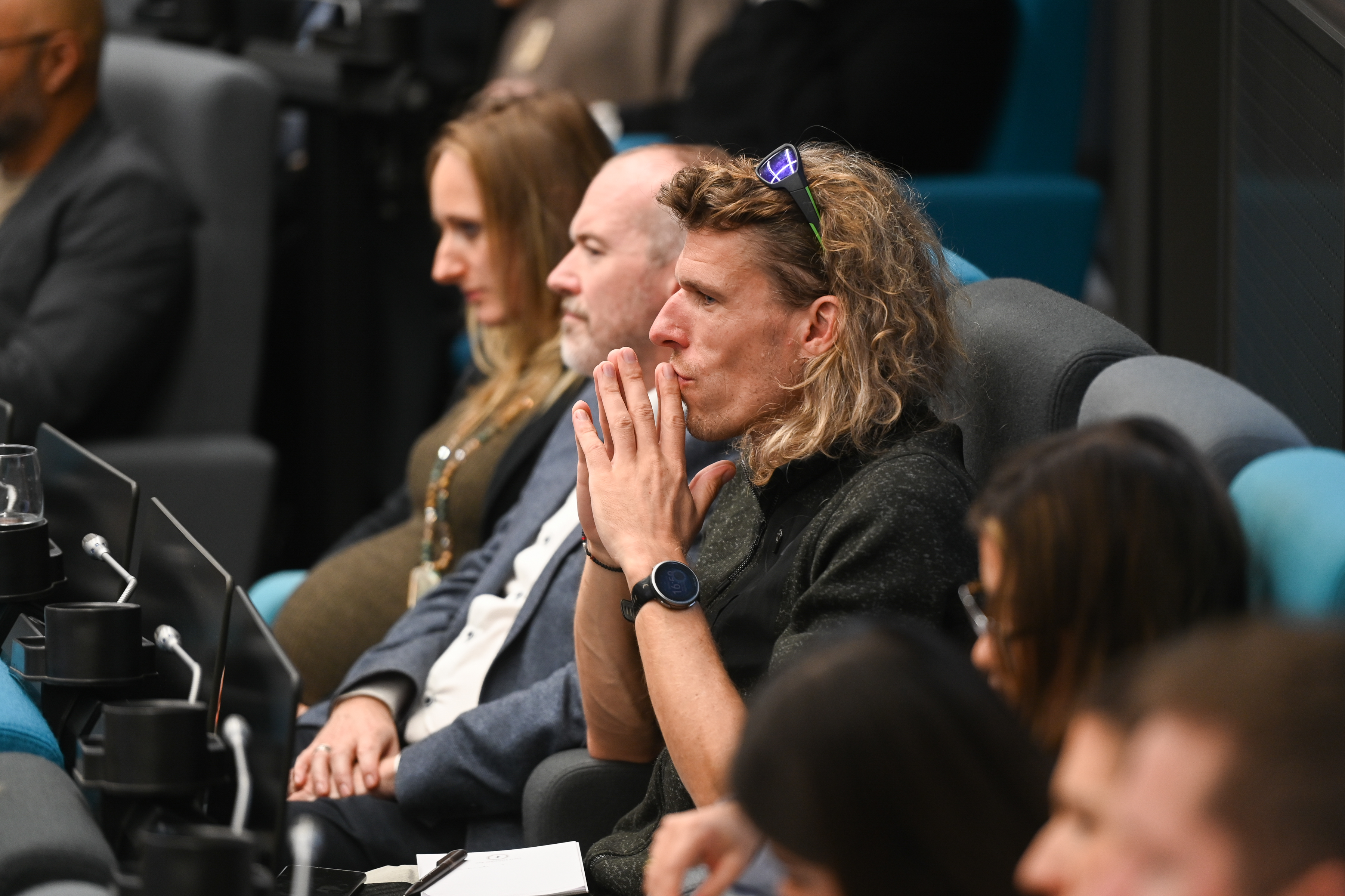 Steven Keen attending an ICRT event listening intently