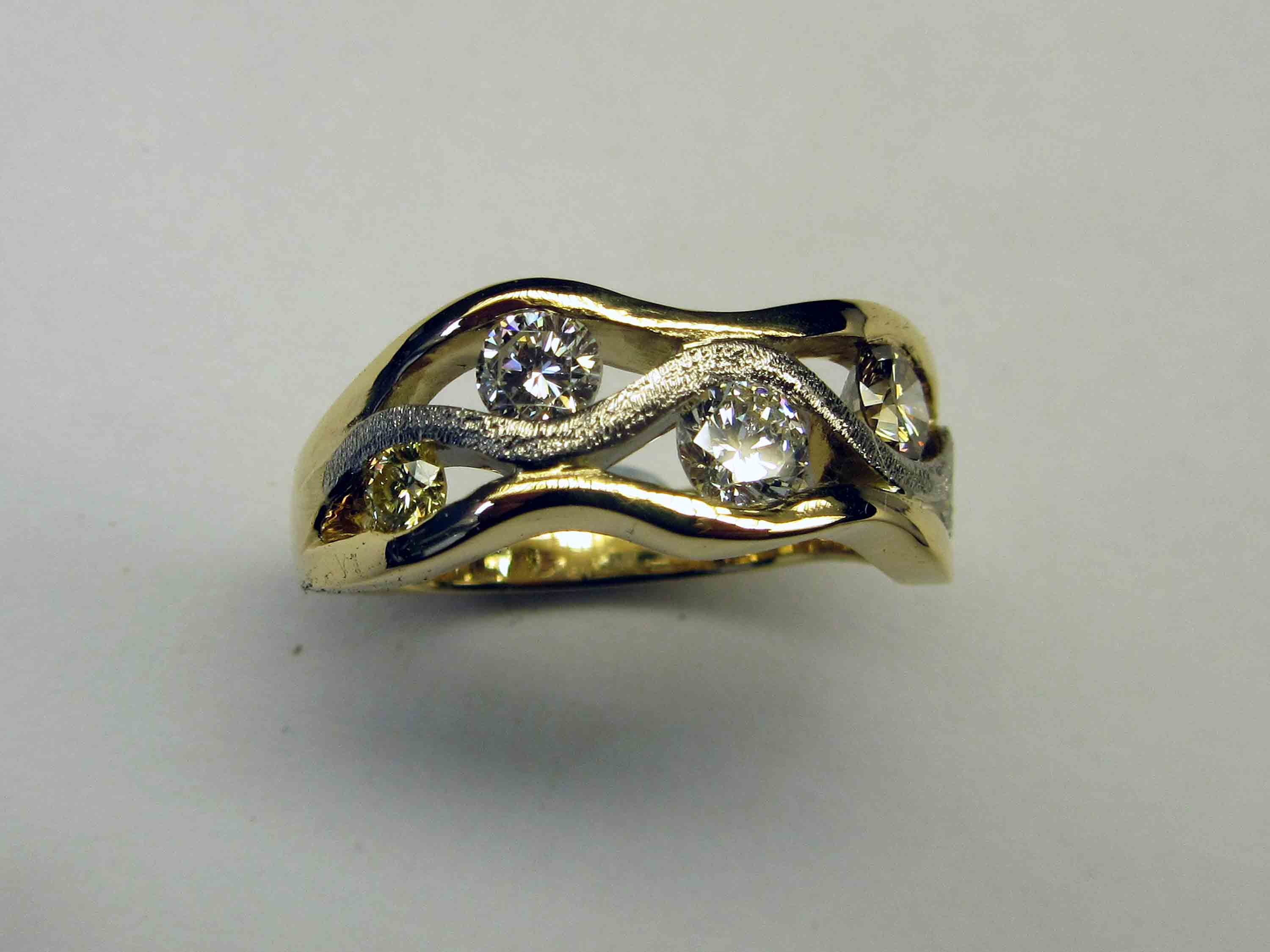 Diamond set wave ring