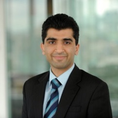 A person wearing a suit and tie

Description generated with very high confidence