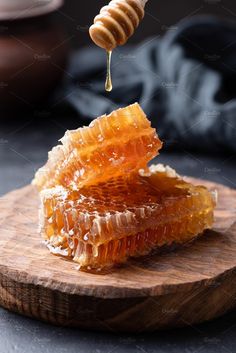 Honeycomb and honey dipper by The baking man on @creativemarket