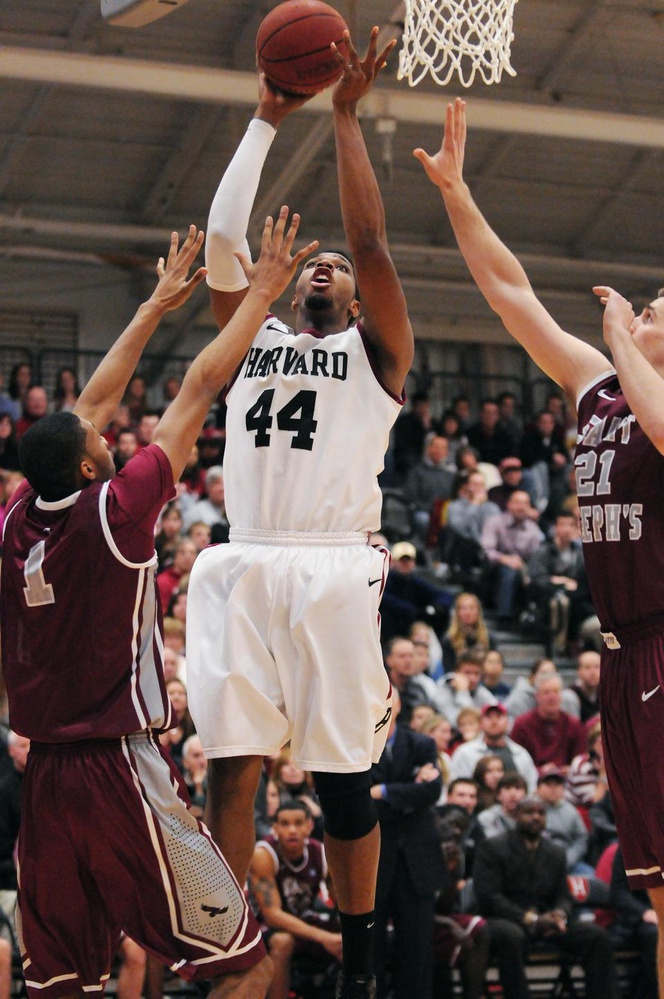 Captain Keith Wright extends while dominating the backboard.