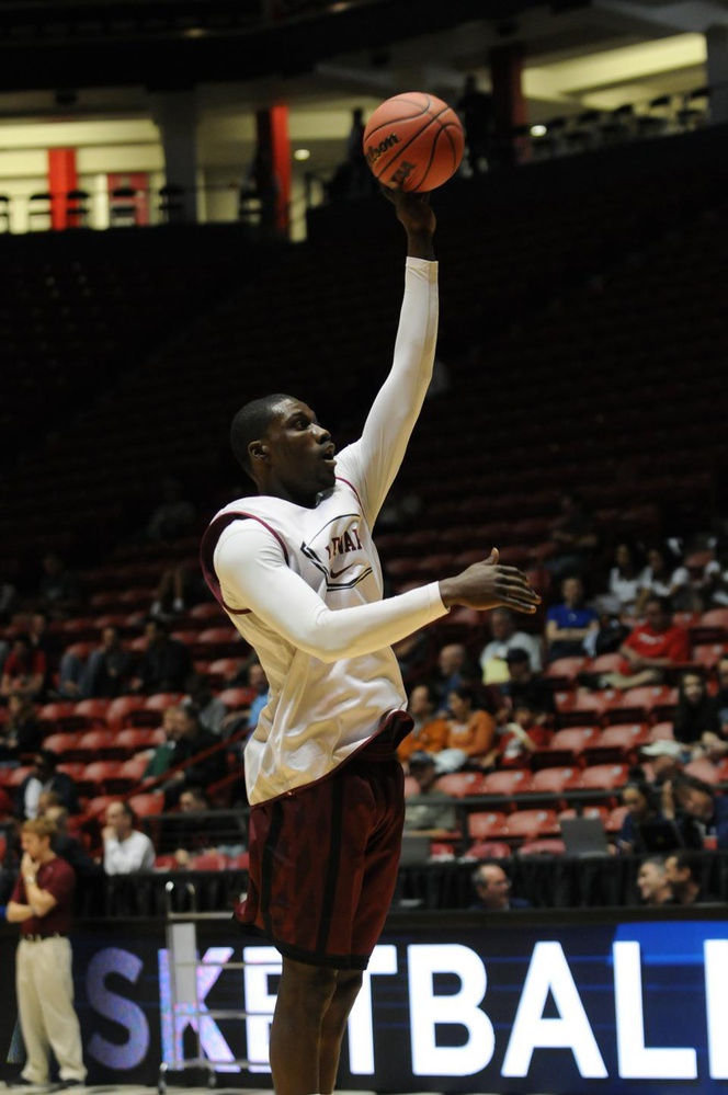 Junior forward Kyle Casey attempts a shot at Wednesday's open practice in Albuquerque.  