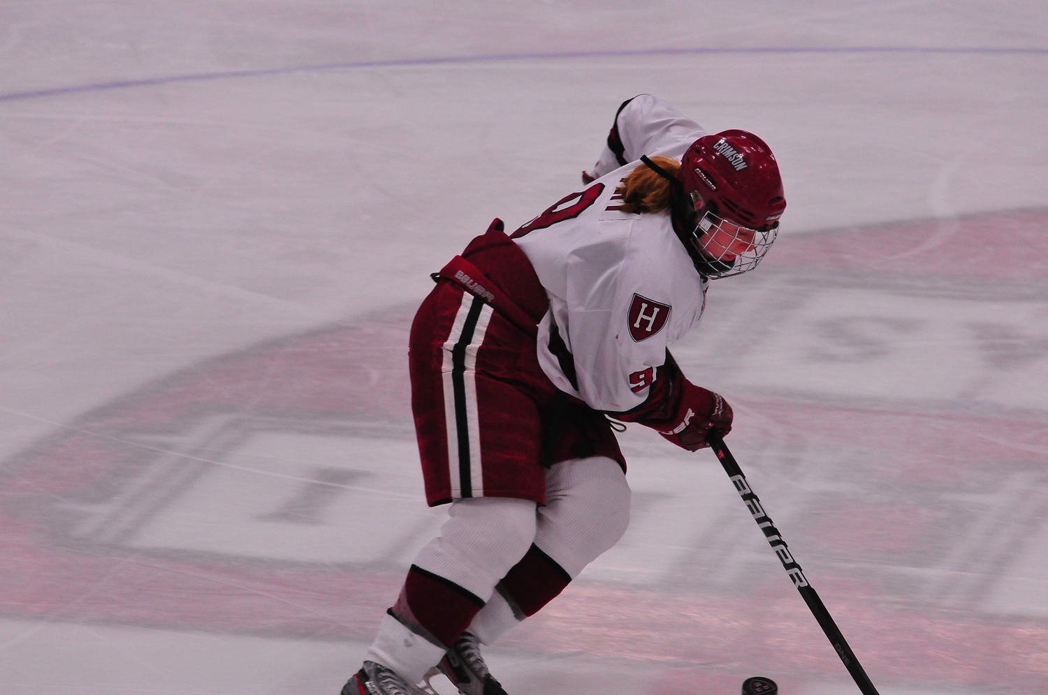 Rising senior Lyndsey Fry, pictured above in action in 2012, and four other past and current Harvard women's hockey players made USA Hockey's 25-man roster, which was announced Monday.