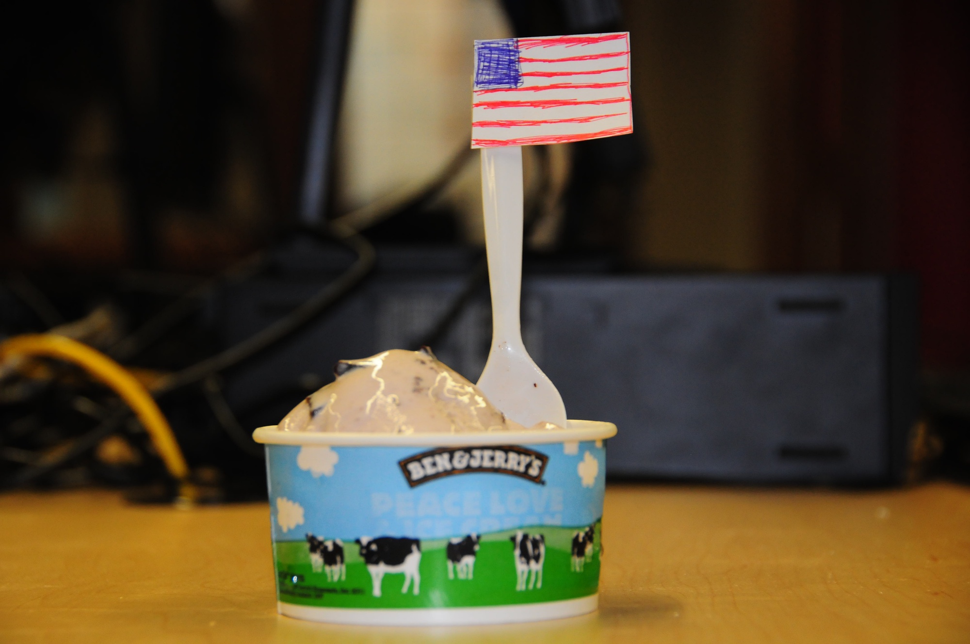 Old Glory, or at least a close equivalent, flies atop a mound of Ben and Jerry's Greek frozen yogurt.