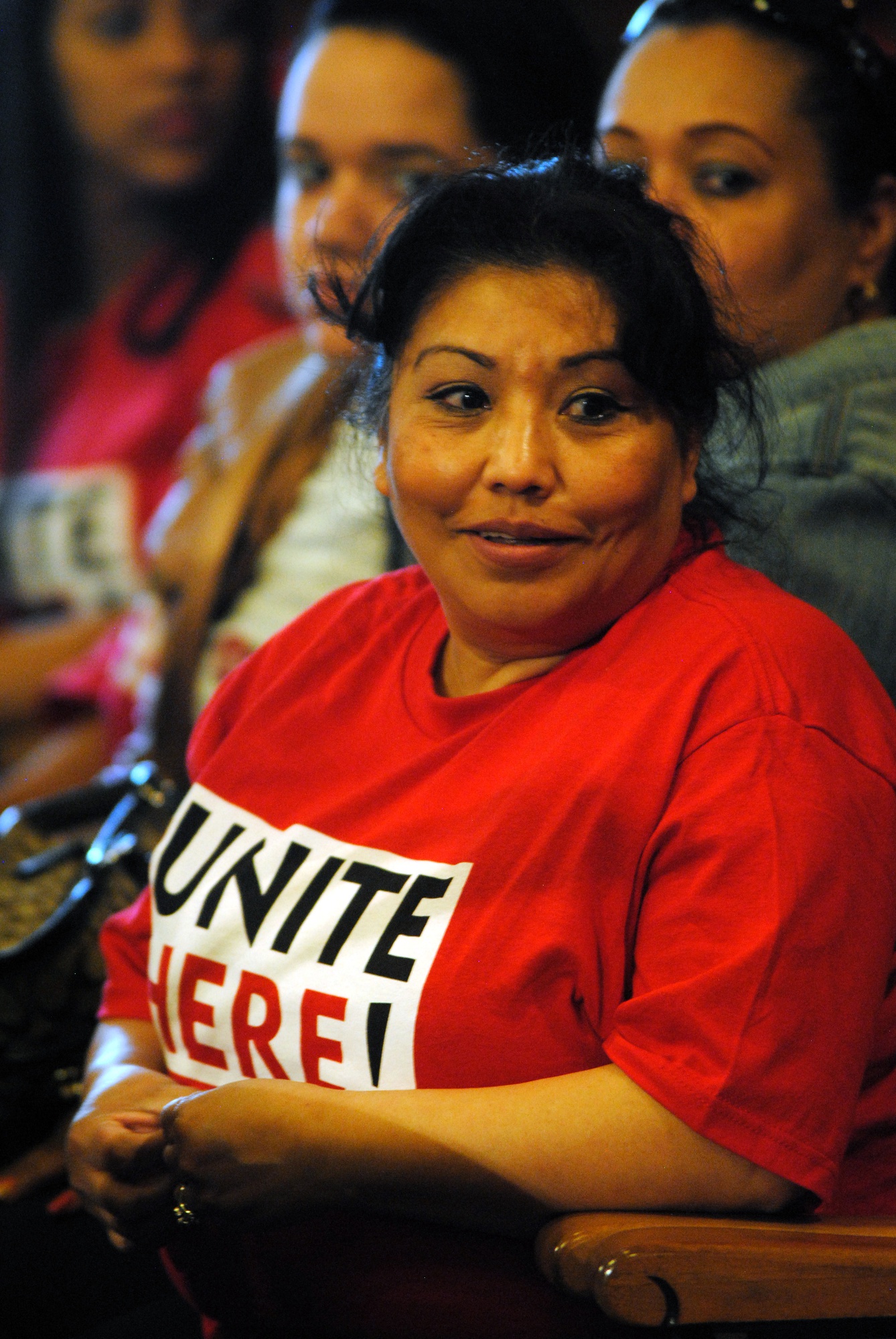 Sandra Herandez, an employee of the Doubletree Hotel in Allston, waits to give a statement at the Cambridge City Council meeting on April 28. A housekeeper at the hotel for twenty two years, Hernandez exclaimed "I'm here for a fair process".