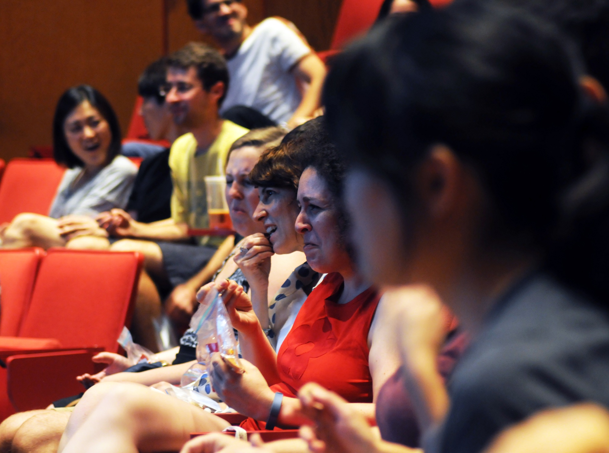 Audience members at “Thinking About Flavor” cringe on Monday evening as they eat an herb that causes them to lose their ability to taste sweetness. The talk, delivered by food radio host Dave Arnold and food writer Harold McGee, is part of the Science and Cooking 2015 Lecture Series.