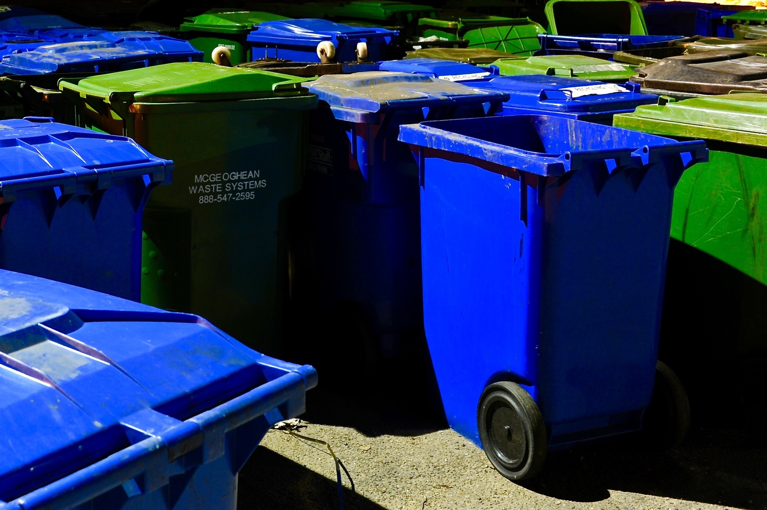 A collection of trash and recycle bins sit behind the construction site for the "Gateway project." Construction on the building will continue through 2016, though University administrators are unsure at this point whether to dedicate it for academic purposes, or use it as a “mixed use institutional building” as originally intended.