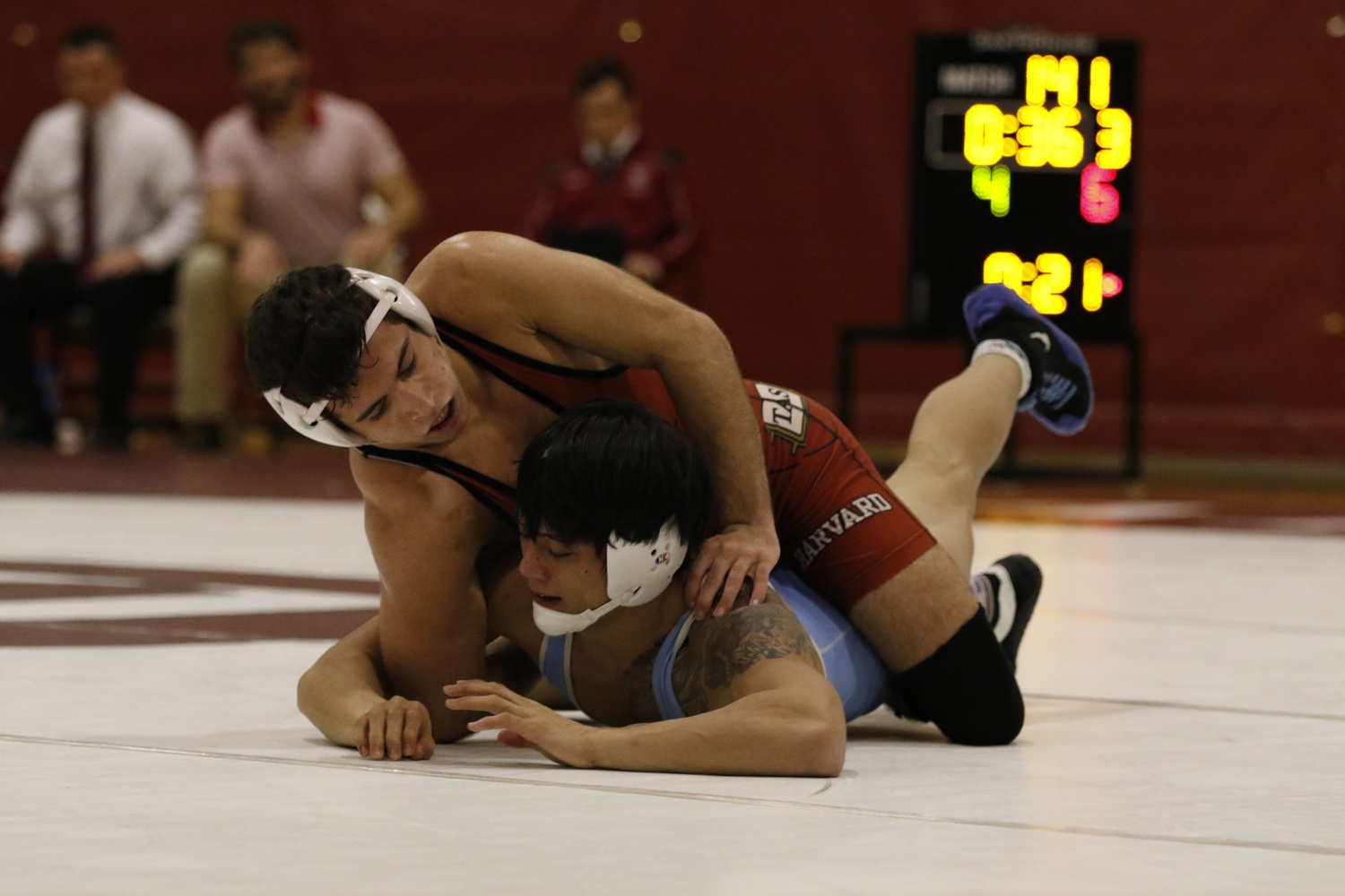 Harvard wrestling (pictured in earlier competition against Columbia) went undefeated on its first weekend of dual meets.