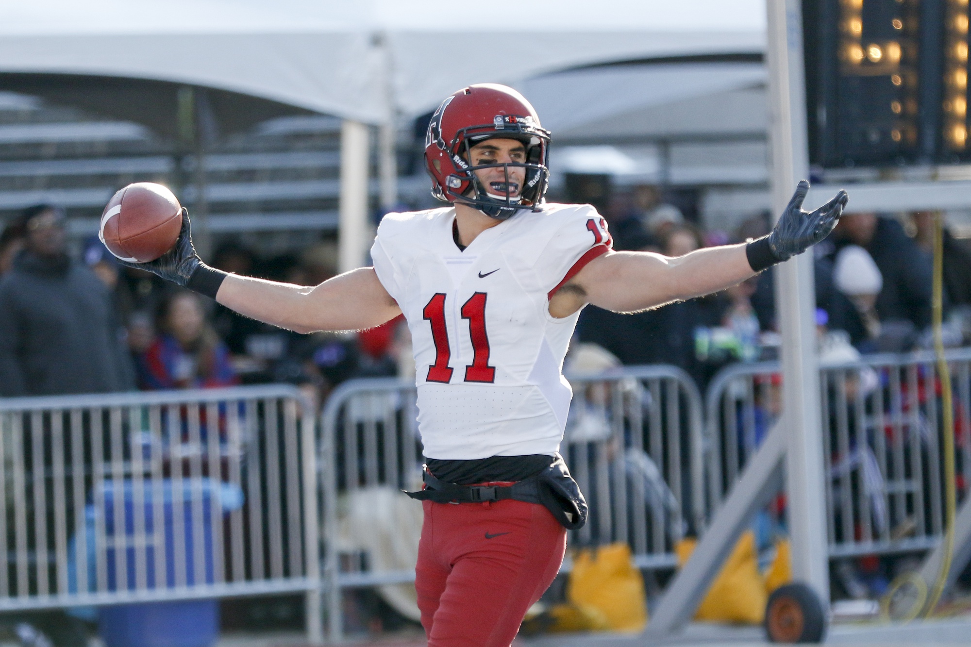 Senior wide receiver Brian Dunlap celebrates after scoring his first touchdown of the afternoon. The veteran finished the match with both of the team's touchdown receptions.