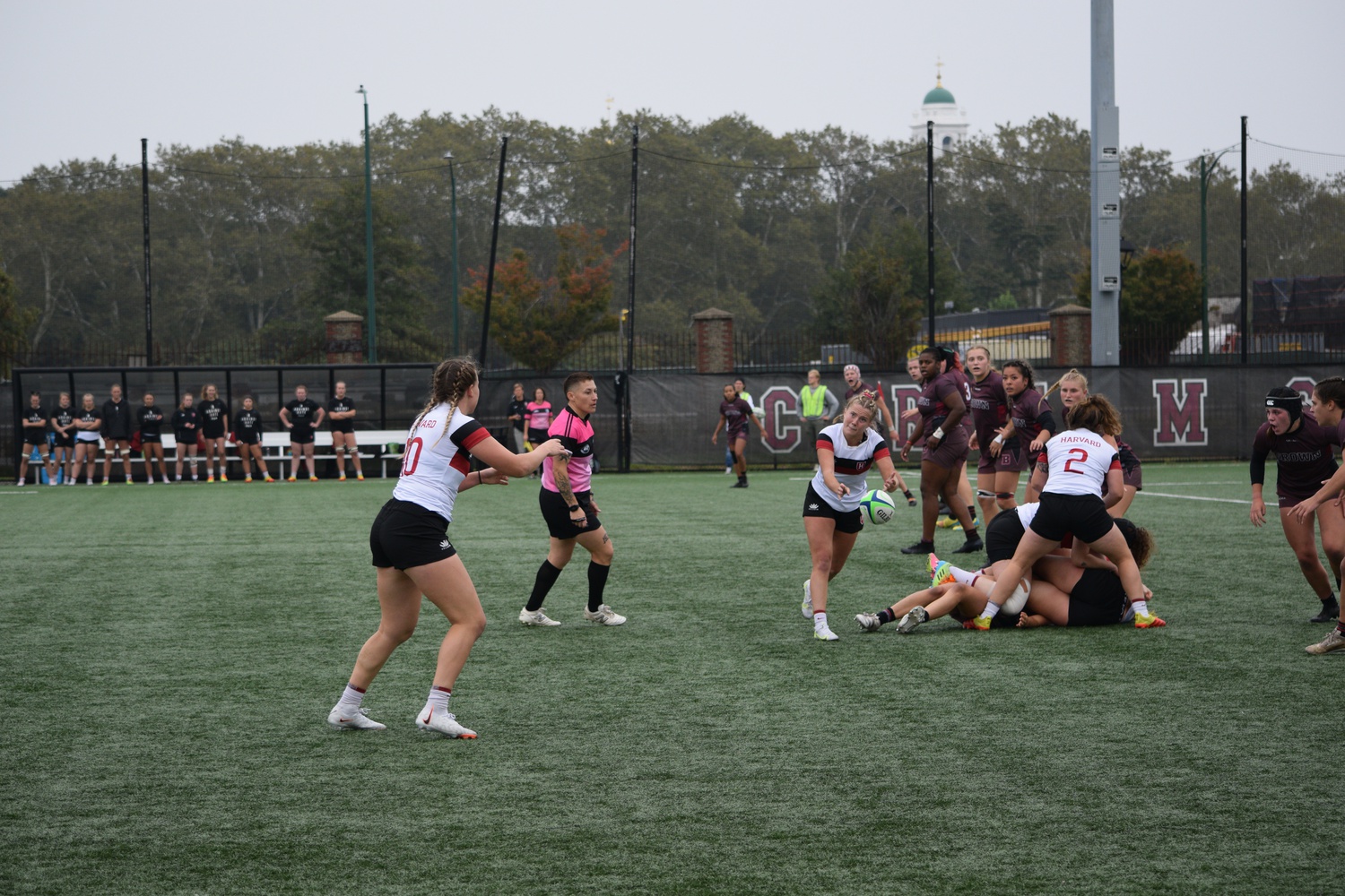 Harvard women's rugby turns the ball upfield at home against Brown on September 30.