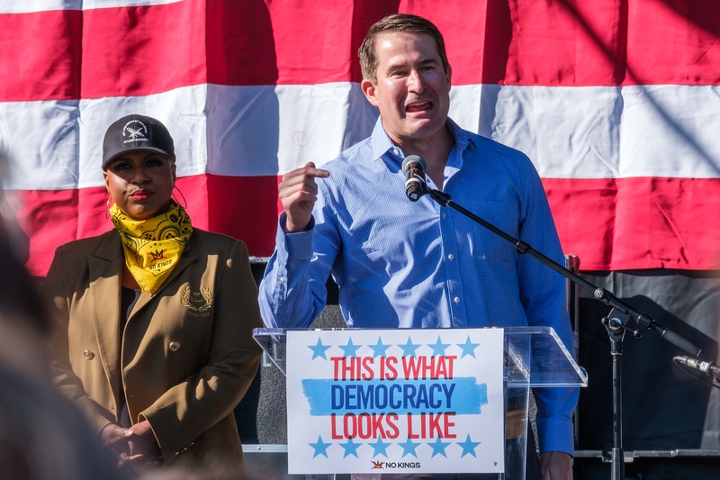 Congressman Seth W. Moulton '01 on stage at No Kings protest in Boston Commons