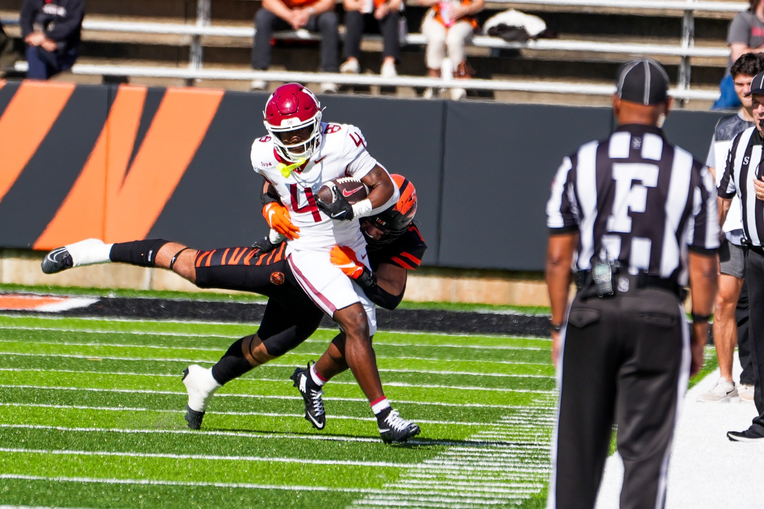 Senior Cam Henry powers through a tackle.