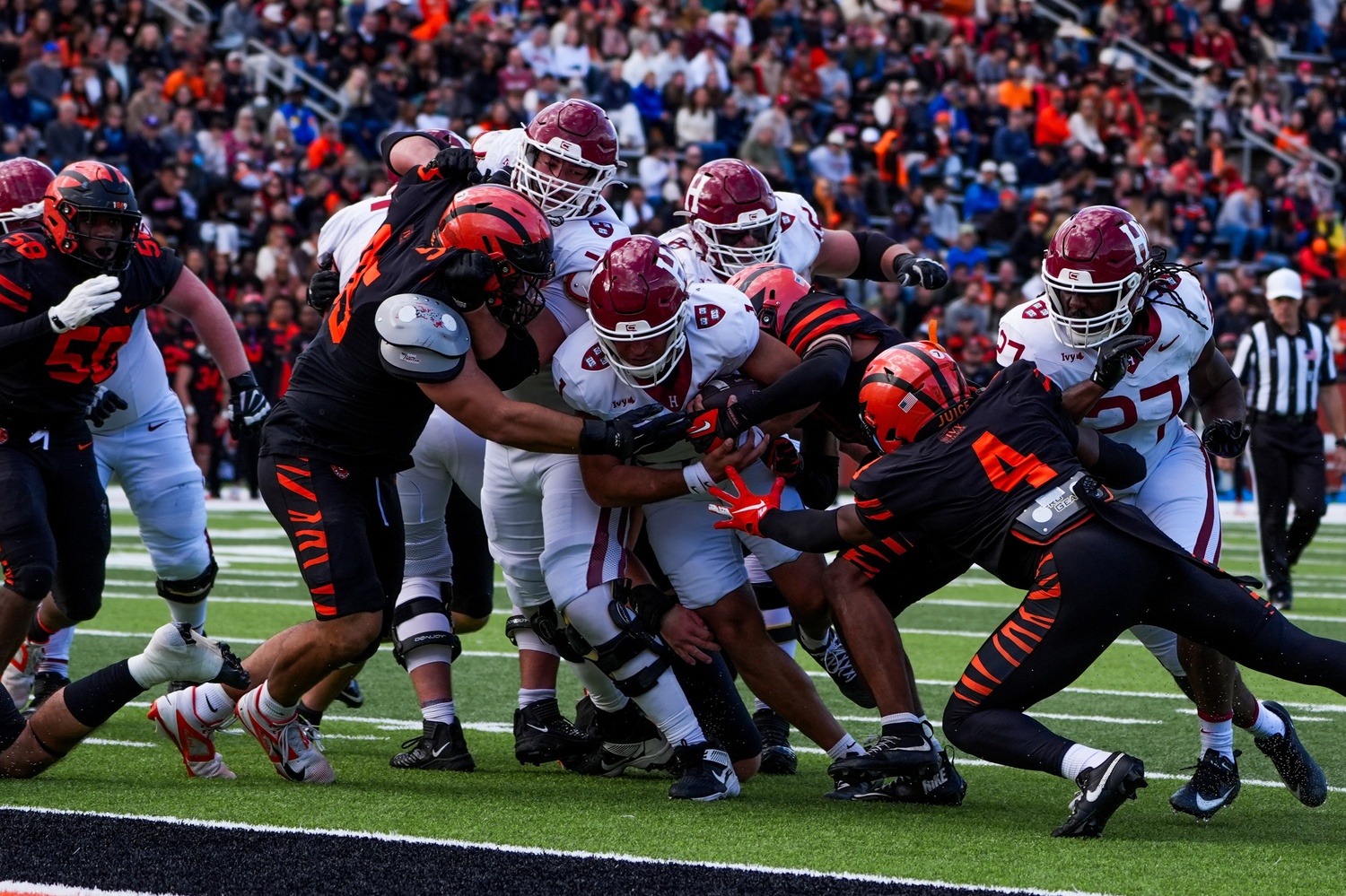 In a game full of rushing attempts by the quarterback, Craig scrambles for the endzone.