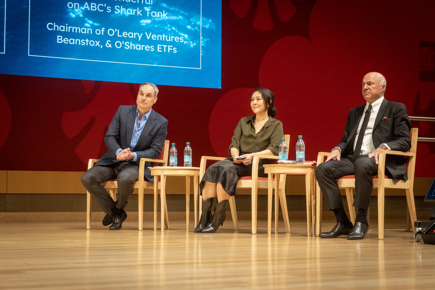 Investors Oliver Haarmann, Janelle Teng, and Shark Tank's Kevin O'Leary judge a competition at Harvard Business School with a $100k prize.