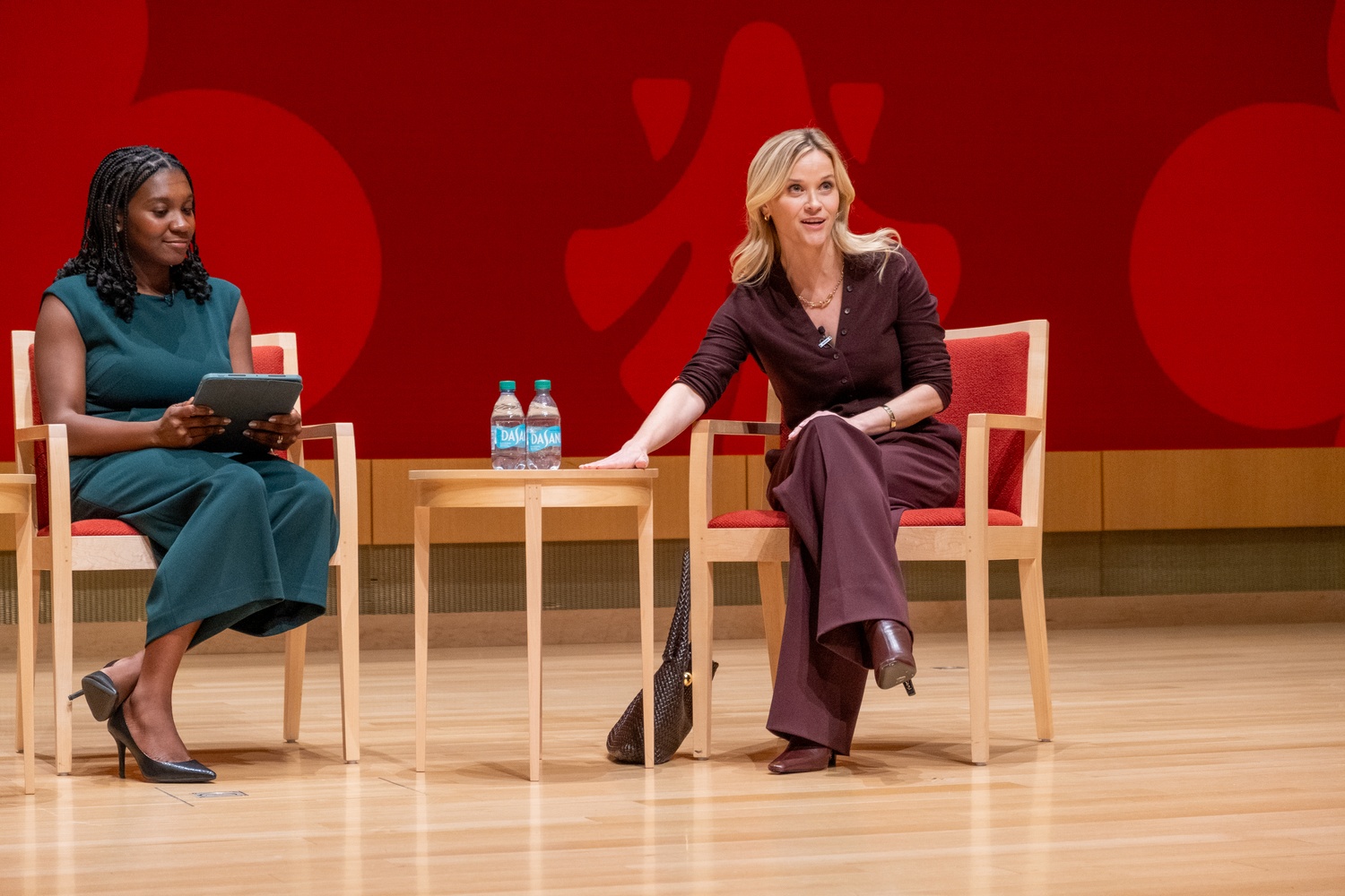 Actress Reese Witherspoon speaks with Jadyn Bryden at a Harvard Business School fireside chat organized by the Women Students Association.
