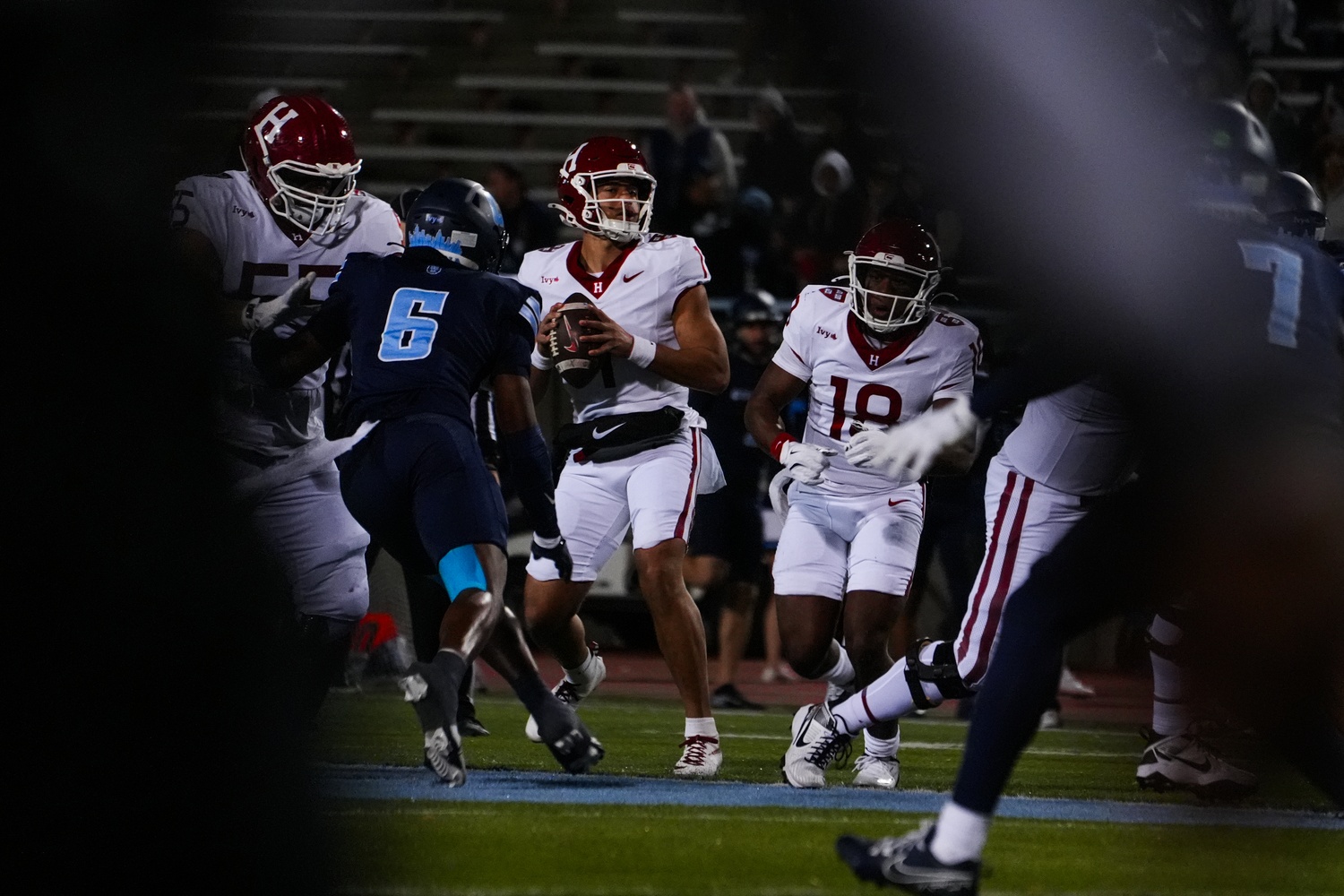 Senior quarterback Jaden Craig drops back during Harvard's decisive victory over Columbia.