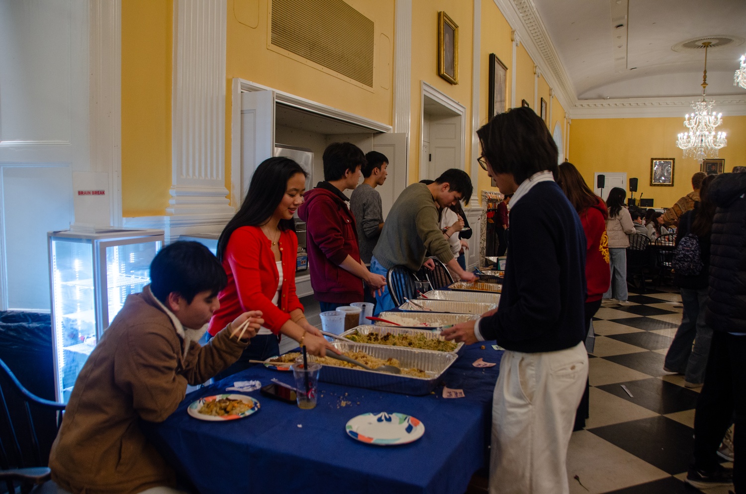 Students serve food at the Taiwanese Cultural Society's Night Market on Friday.
