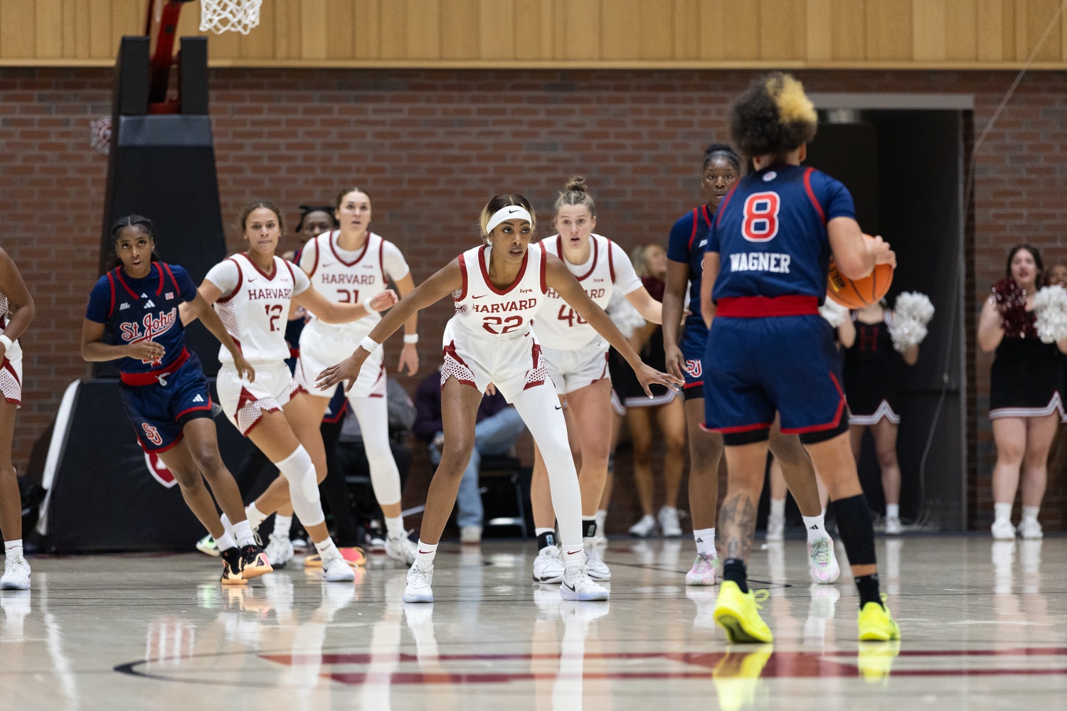The women's basketball team plays defense against St. John's in its opening game of the 2025-26 season.