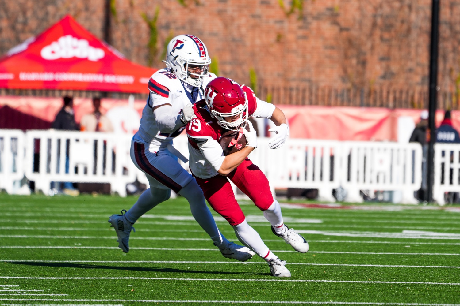 Sophomore wide receiver Brady Blackburn hauls in a pass from quarterback Jaden Craig.