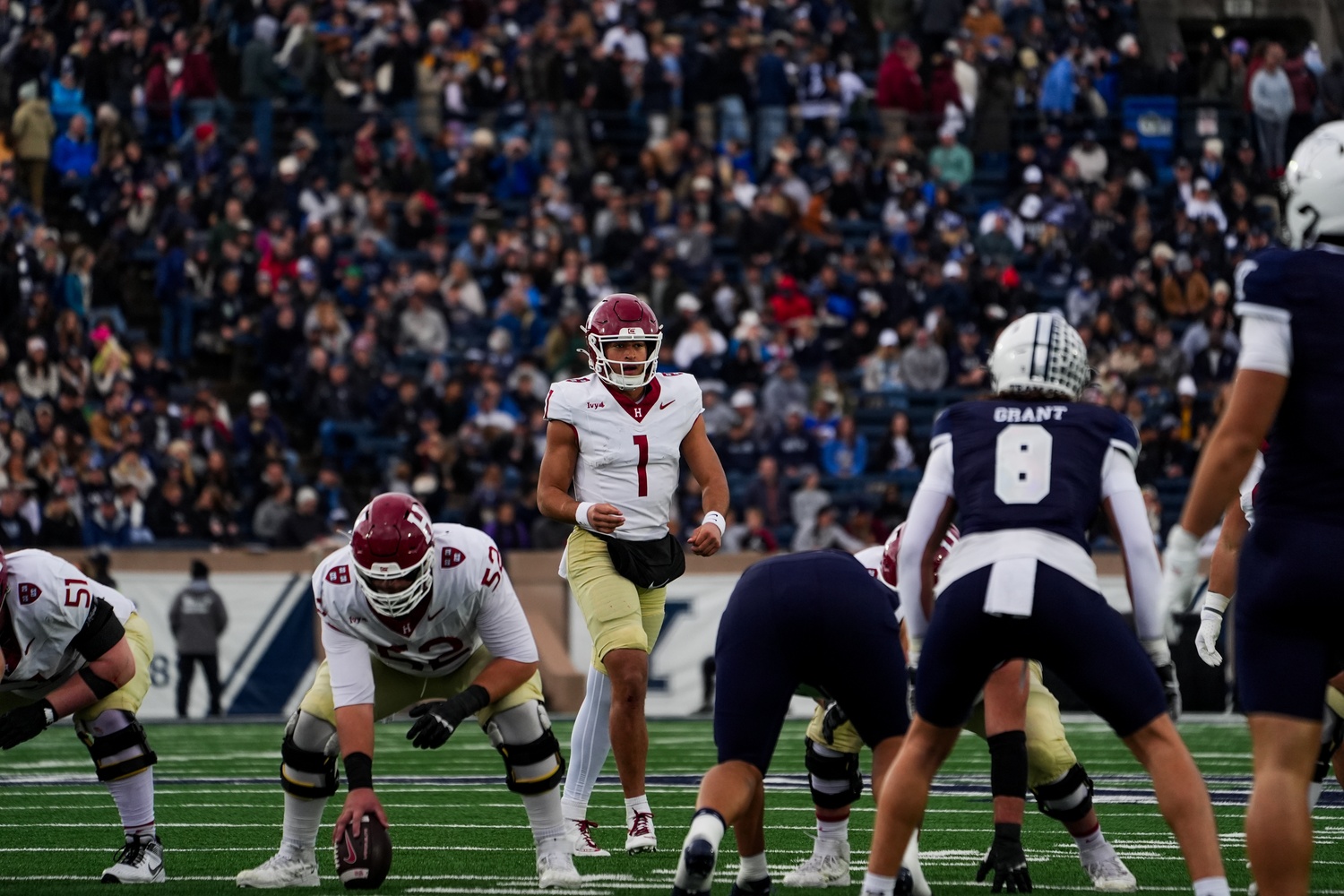 Quarterback Jaden Craig prepares at the line.