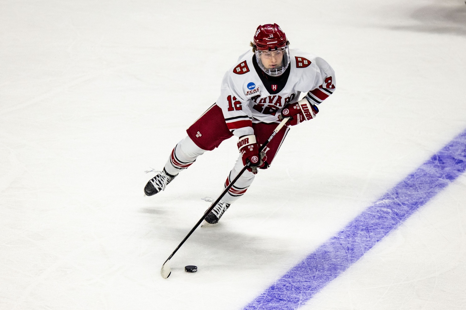 Joe Miller skates with the puck during the team's game against Ohio State in the first round of the 2023 NCAA Tournament.