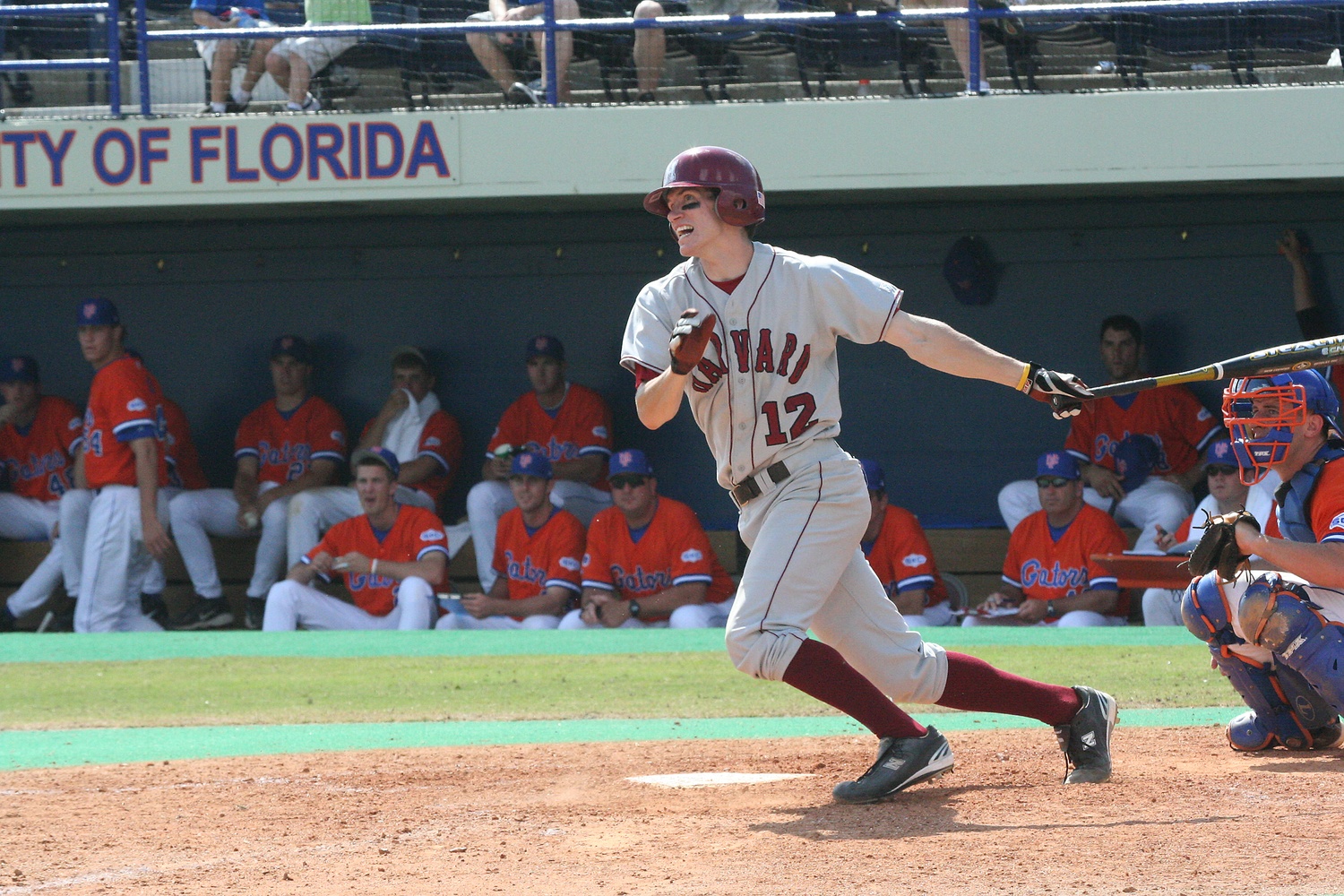 Morgan Brown '06 records a hit against the Florida Gators. Brown now works as an Advisor for Baseball Development for the Los Angeles Dodgers. Since graduating from Harvard, Brown, who walked on to the Crimson roster, has been an active participant in Harvard's community and in professional baseball. He got his master’s degree at the Kennedy School, worked as the Director of Baseball Operations for Harvard, and served as the Executive Director of the Institute of Politics. Brown and the Dodgers organization won the 2025 World Series. 
