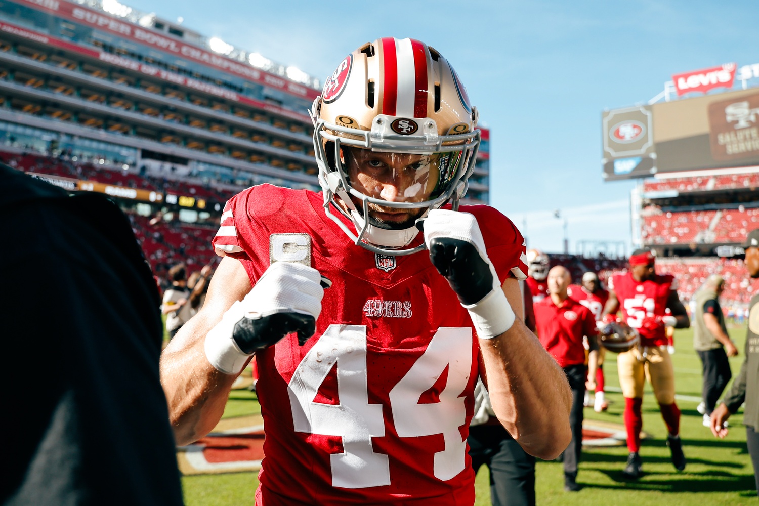 Kyle Juszczyk '13 poses on the field in Levi's Stadium, home of the 49ers. After becoming comfortable at Harvard and within the greater FCS level of play, Juszczyk had to adapt again to pursue his NFL aspirations, switching to the fullback position.