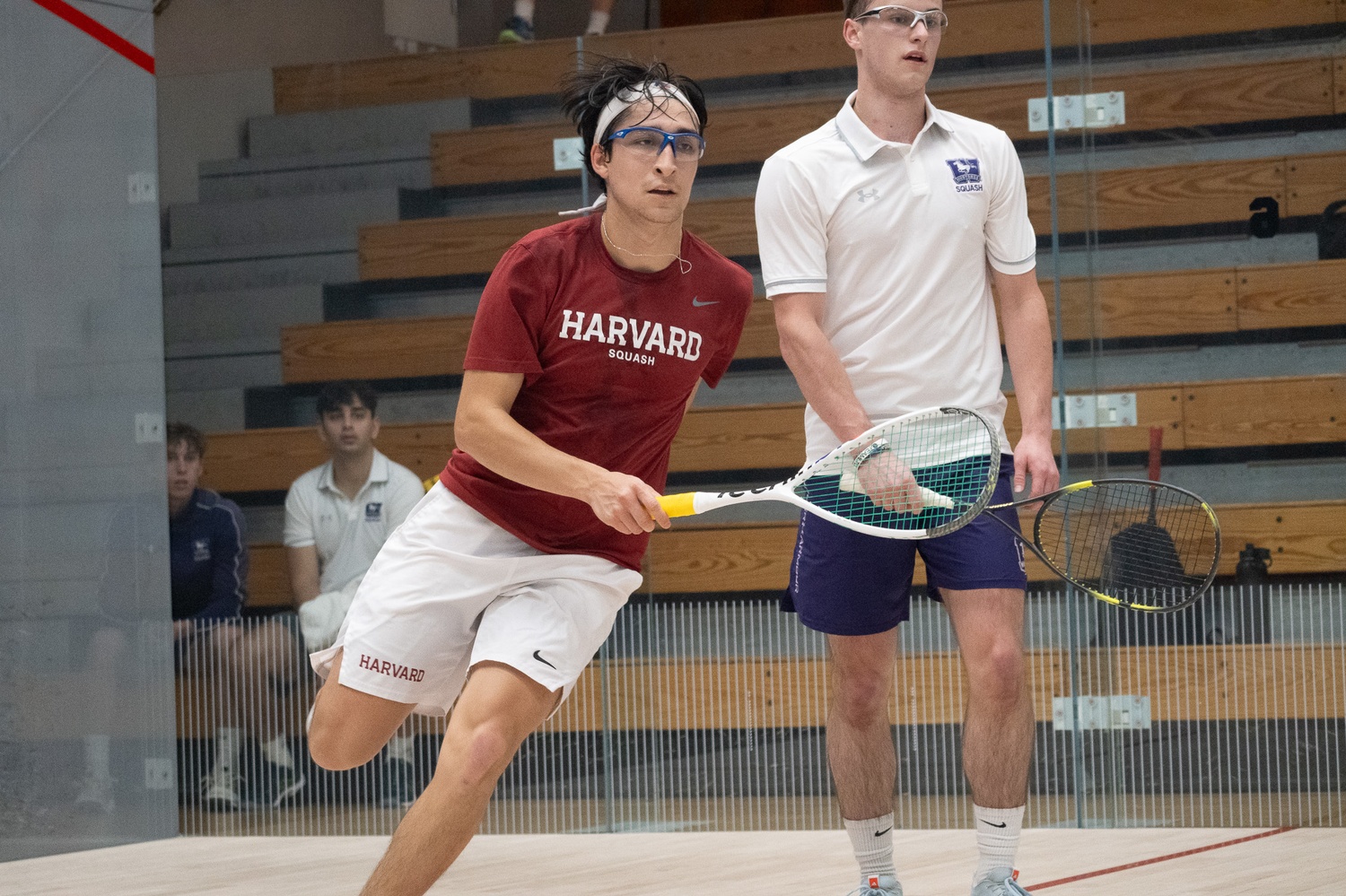 Senior David Costales plays a match against Western Ontario last season. This year, the Harvard men's team beat No. 18 Western Ontario, recording a dominant 9-0 score.