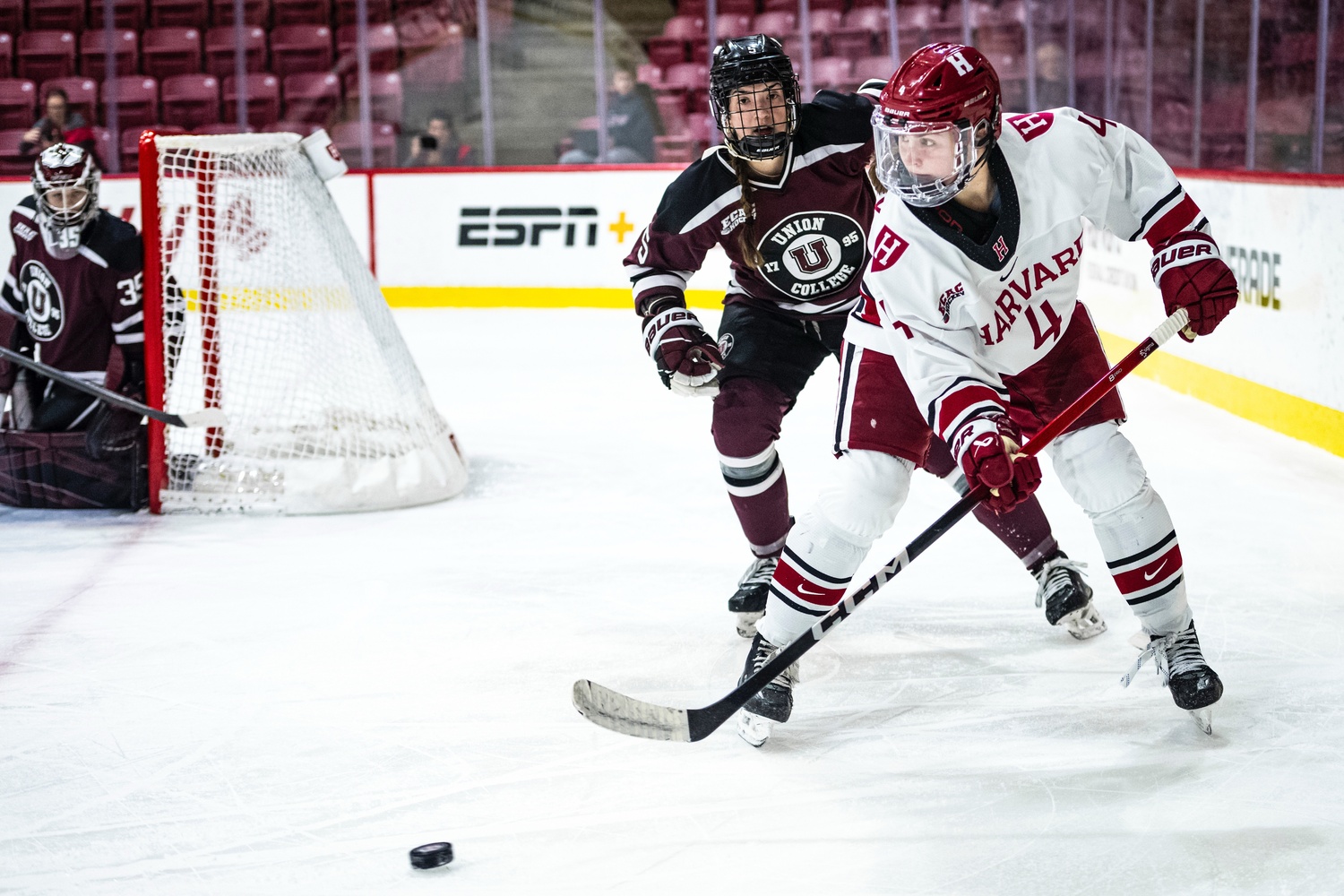 Freshman forward Morgan McGathey attacks behind the net
