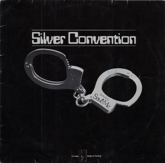 Save me album cover : Handcuff artwork variant for German and some other territorial releases (original German vinyl edition pictured), also used for later western European re-releases