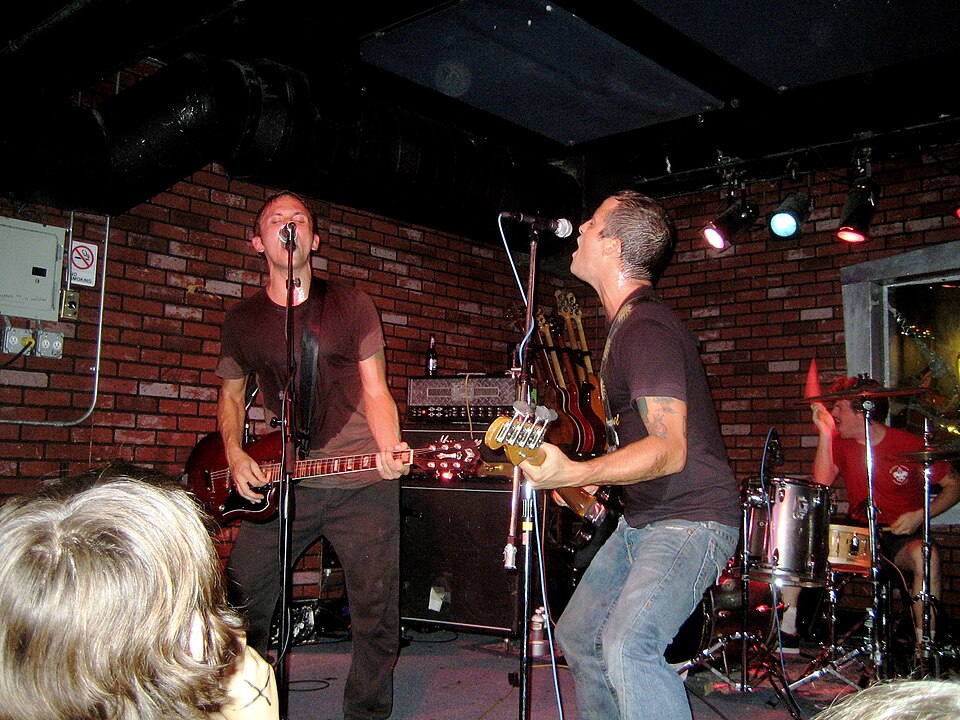 Left to right: McCaughan, Kelly, and Hennessy in 2005