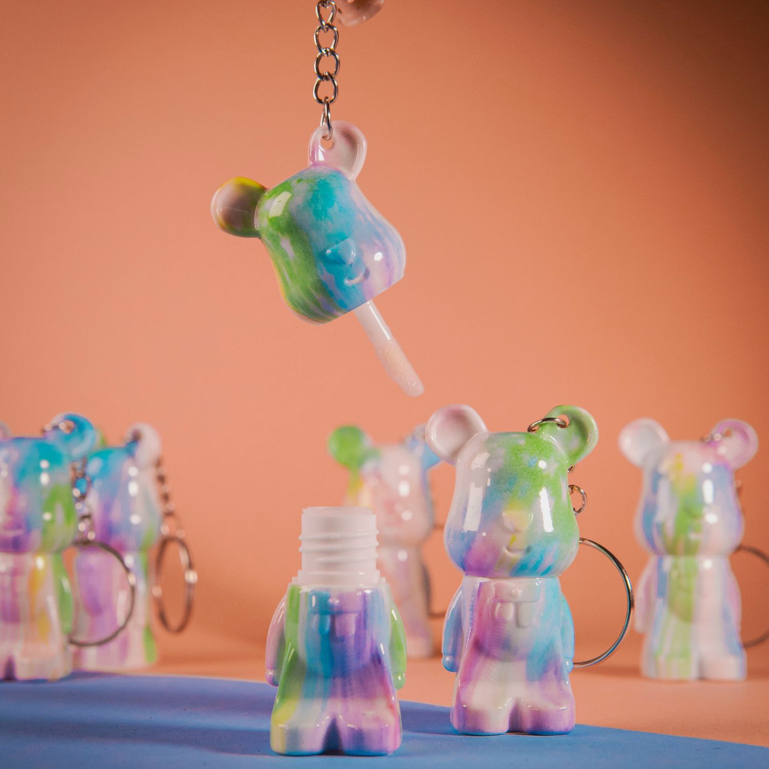 Urso Tiedye Gloss de chaveiro da Mia Make