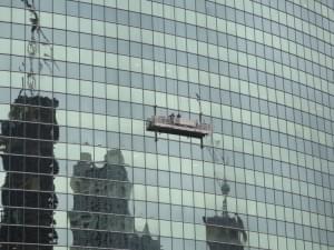 VIDEO: Window Washers Swinging Wildly In A Rig From An Oklahoma Skyscraper