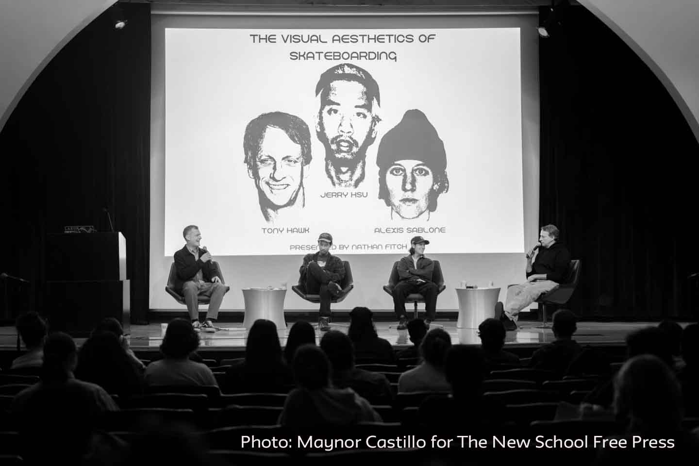 Nathan Fitch on stage with panelists Tony Hawk, Jerry Hsu, and Alexis Sablone.