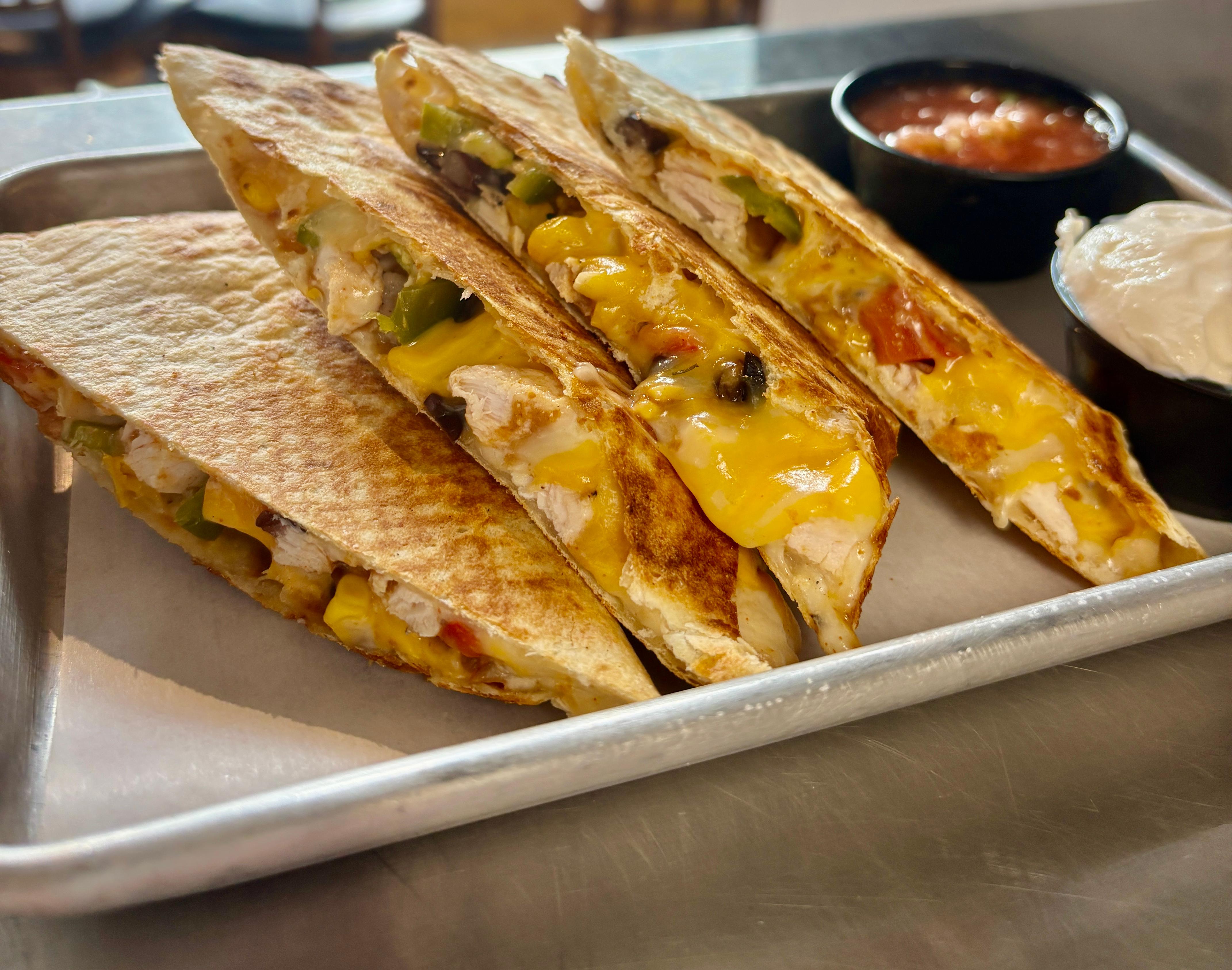 A visualization of the menu item "Chicken Quesadilla"