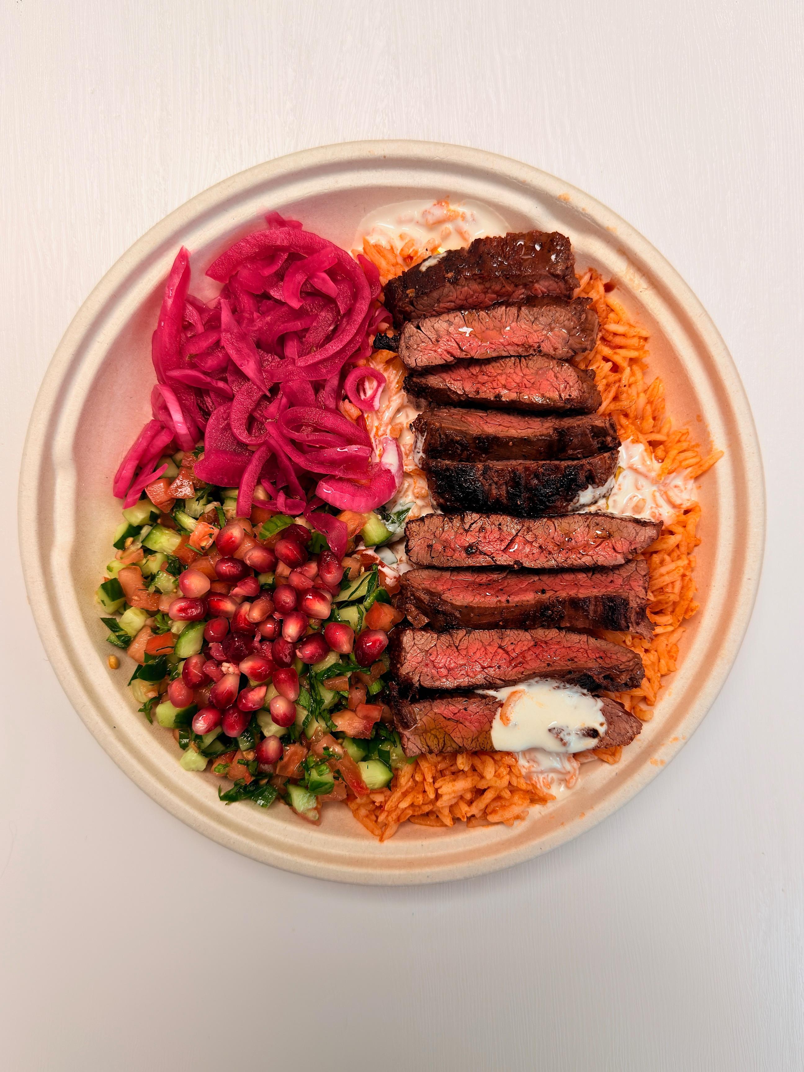 Skirt Steak Rice Bowl at Fil Fil Mediterranean in Homer Glen, IL.