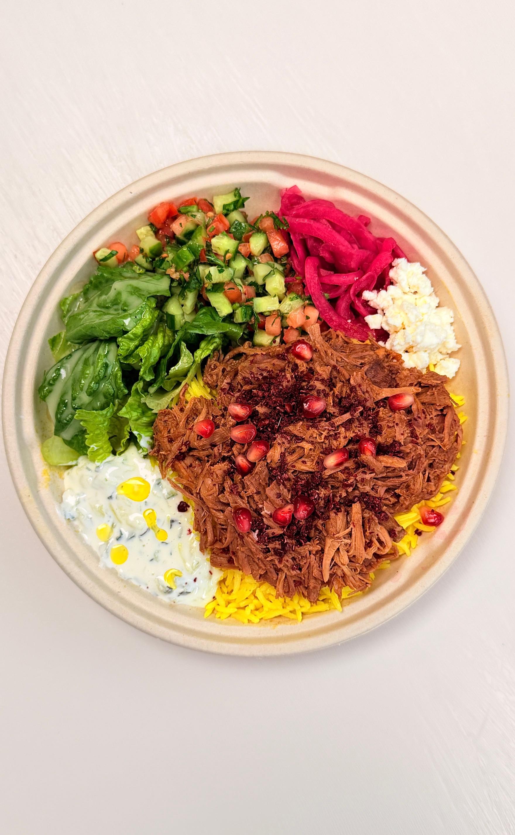 Braised Lamb Rice Bowl at Fil Fil Mediterranean in Homer Glen, IL.