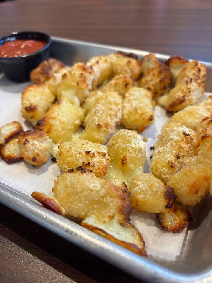 A visualization of the menu item "Cheese Curds"