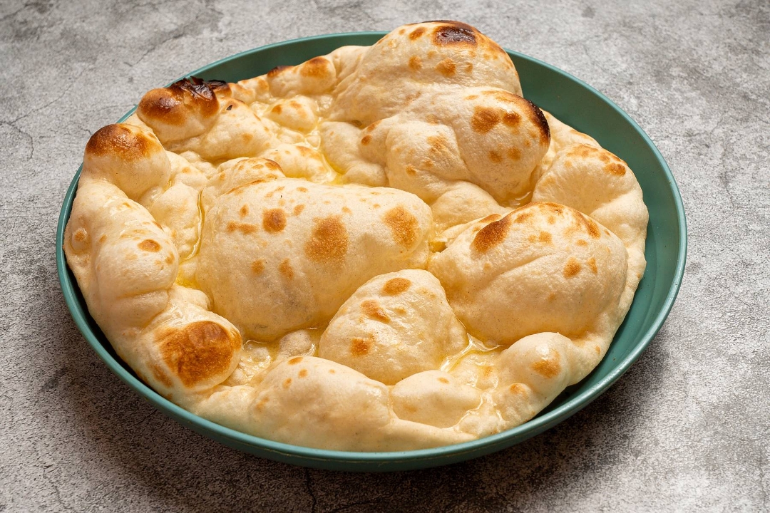 Butter Naan ( 1 Piece)