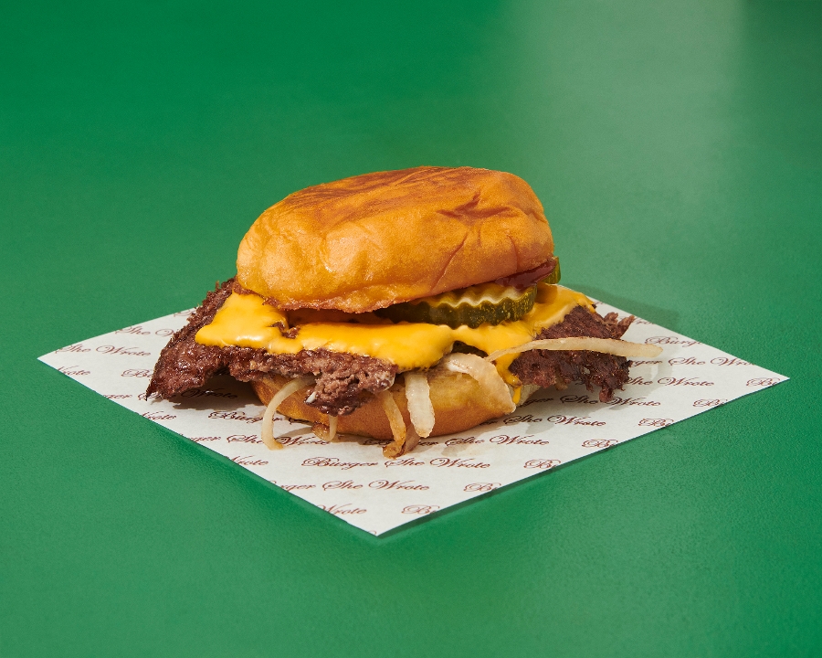 A double Oklahoma smash burger with grilled onions and cheese