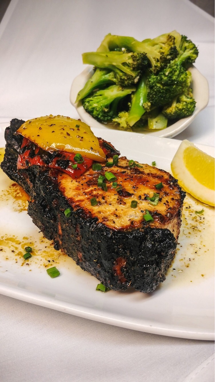 Order Mediterranean Charcrusted Pork Chop food online from Carson's Prime Steaks and Famous Barbecue of Deerfield store, Deerfield on bringmethat.com