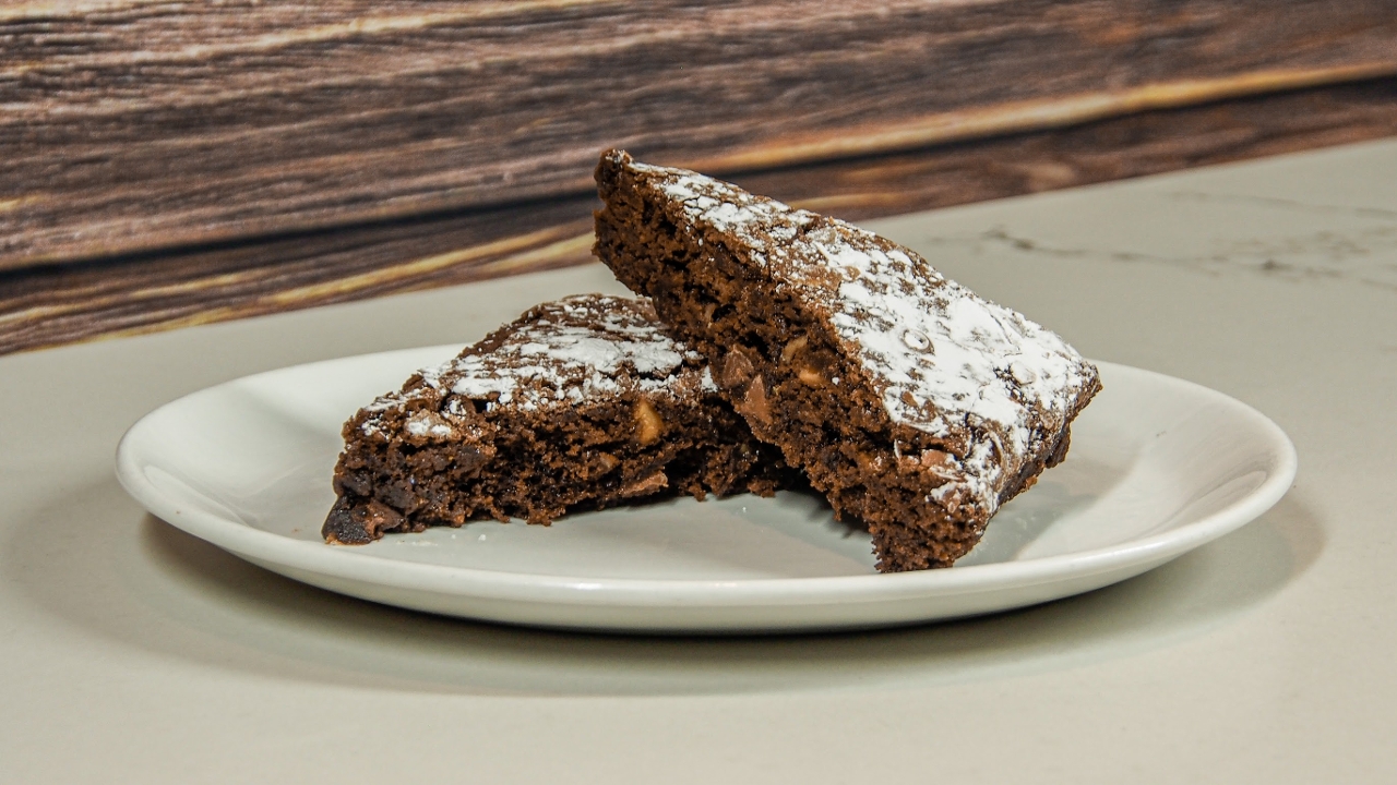 Order Triple Chocolate Walnut Brownie food online from Carson's Prime Steaks and Famous Barbecue of Deerfield store, Deerfield on bringmethat.com