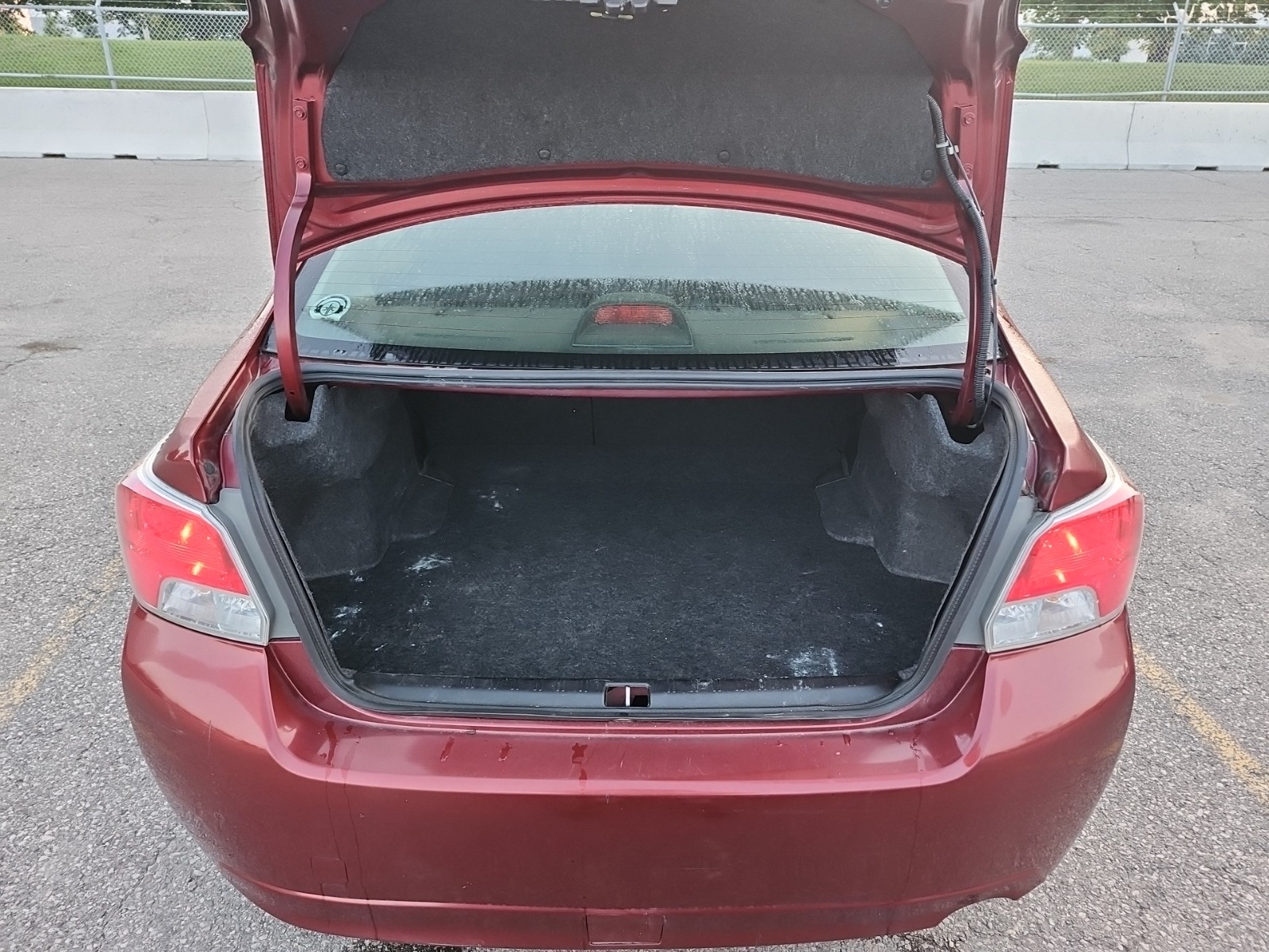 Photo 10 from auction – 2012 SUBARU IMPREZA 2.0I W/TOURING PKG with VIN JF1GJAC64CH009197
