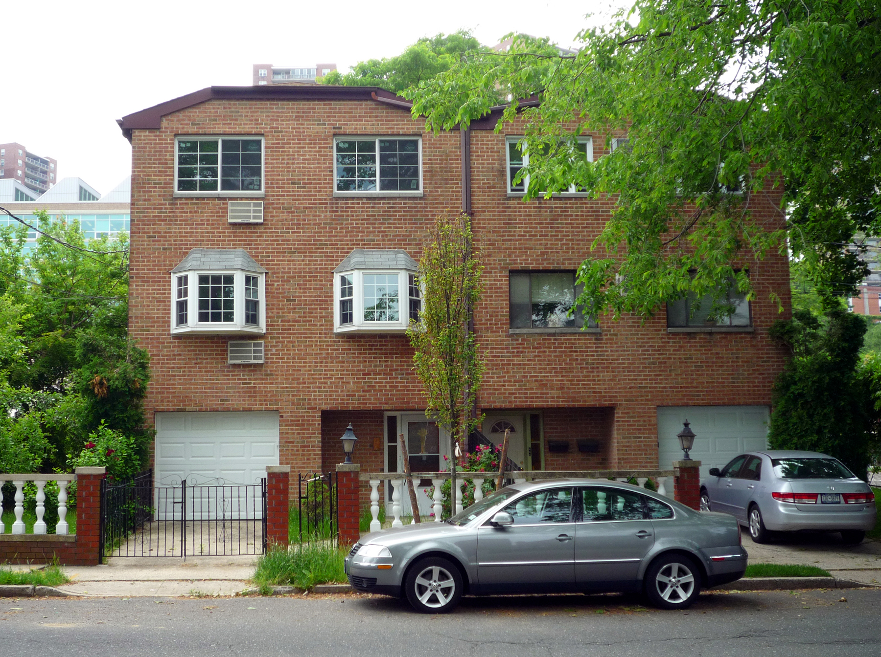 2-Family, Brick Townhouse w/ Spacious Side & Rear Yards