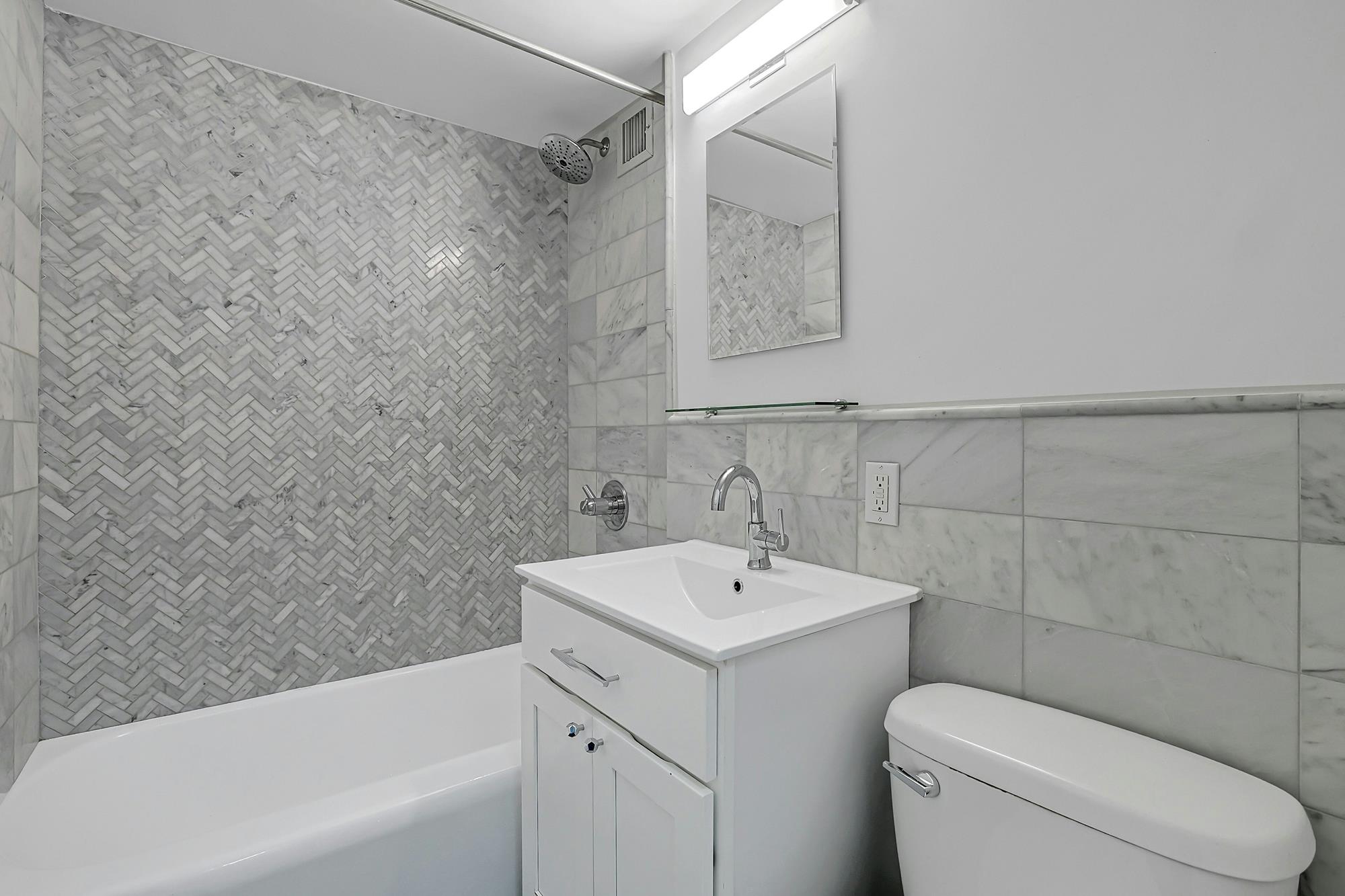 Bright & Renovated 2-Bd., 1.5-Bath Co-op with Balcony, 24-hr. Doormen & Indoor Parking at Briar Oaks
