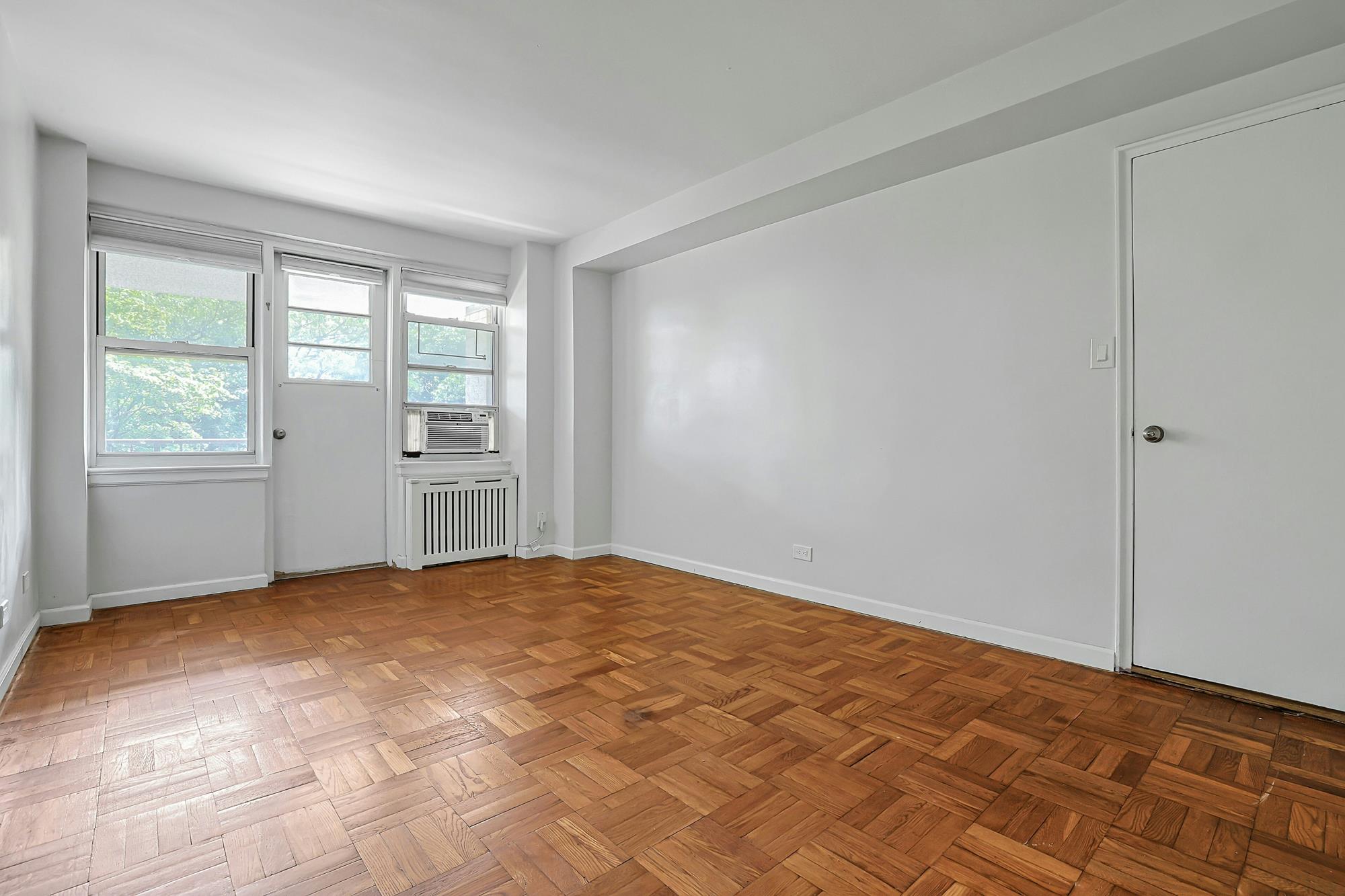 Bright & Renovated 2-Bd., 1.5-Bath Co-op with Balcony, 24-hr. Doormen & Indoor Parking at Briar Oaks