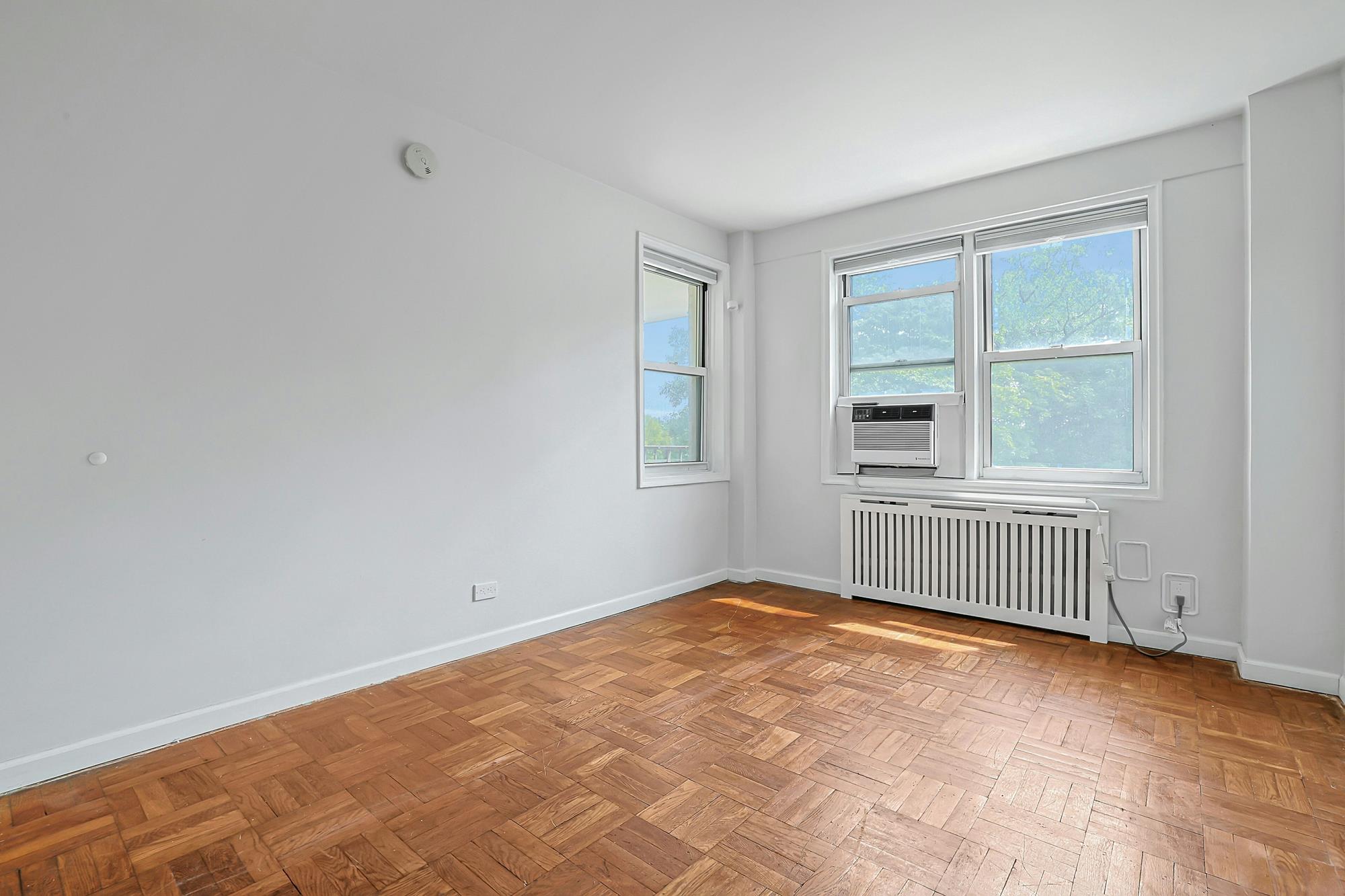 Bright & Renovated 2-Bd., 1.5-Bath Co-op with Balcony, 24-hr. Doormen & Indoor Parking at Briar Oaks