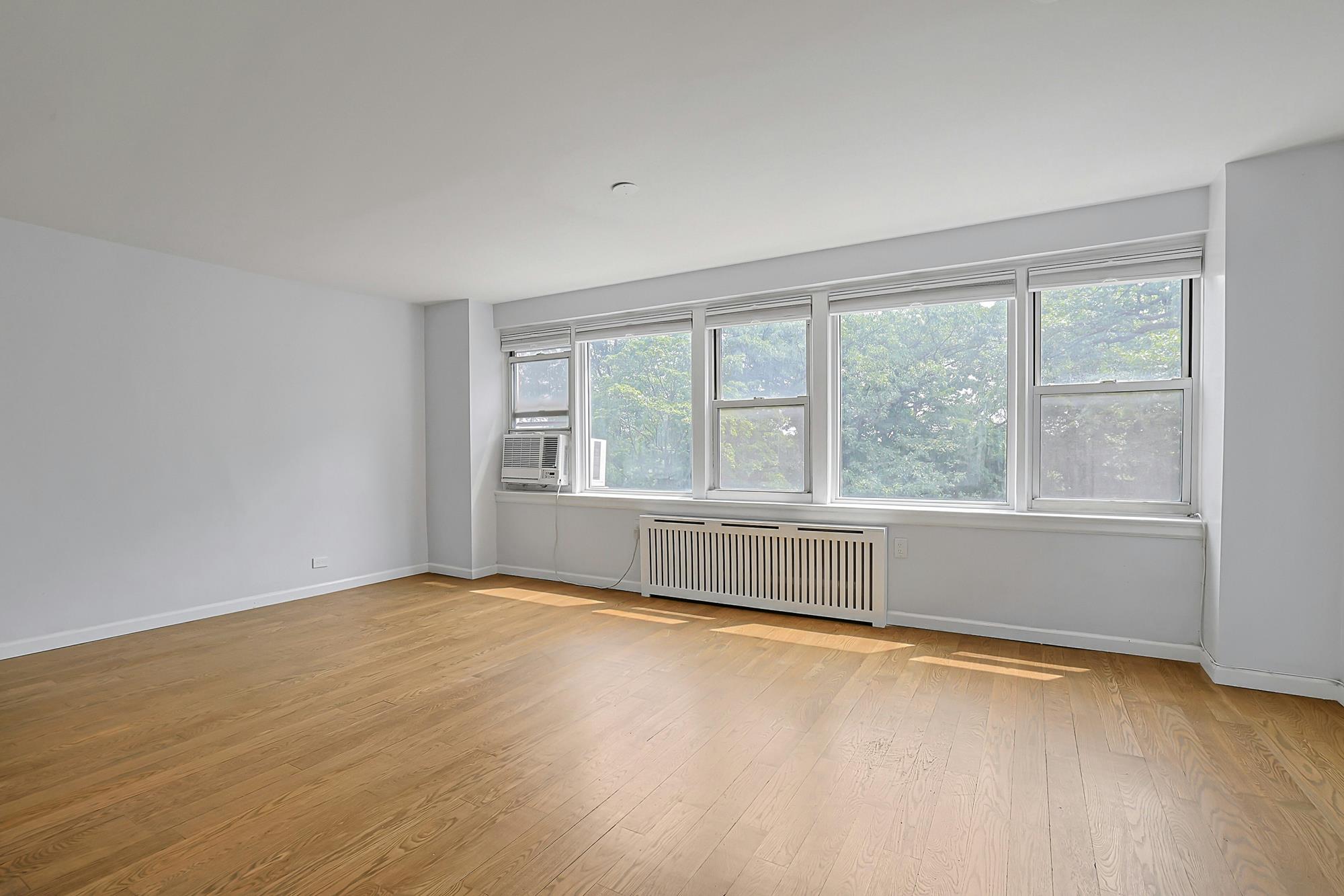 Bright & Renovated 2-Bd., 1.5-Bath Co-op with Balcony, 24-hr. Doormen & Indoor Parking at Briar Oaks